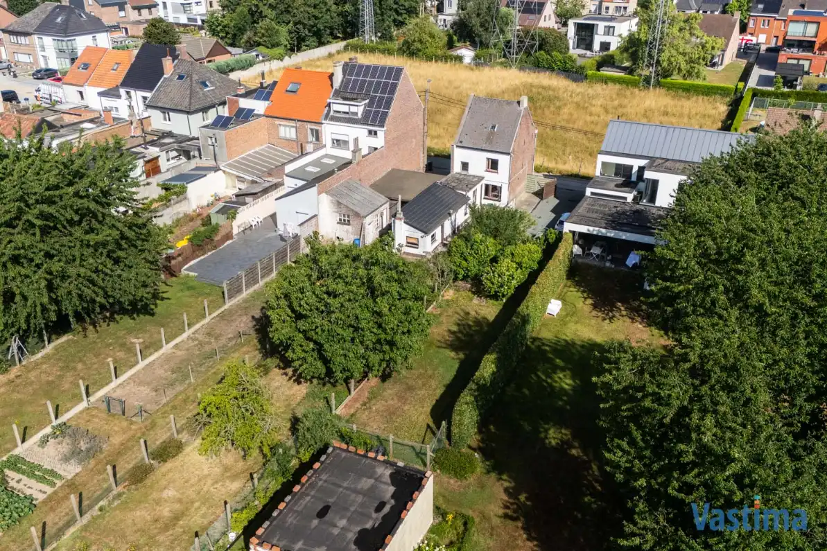 Perceel grond nabij centrum Erembodegem met zuidgerichte tuin foto 3