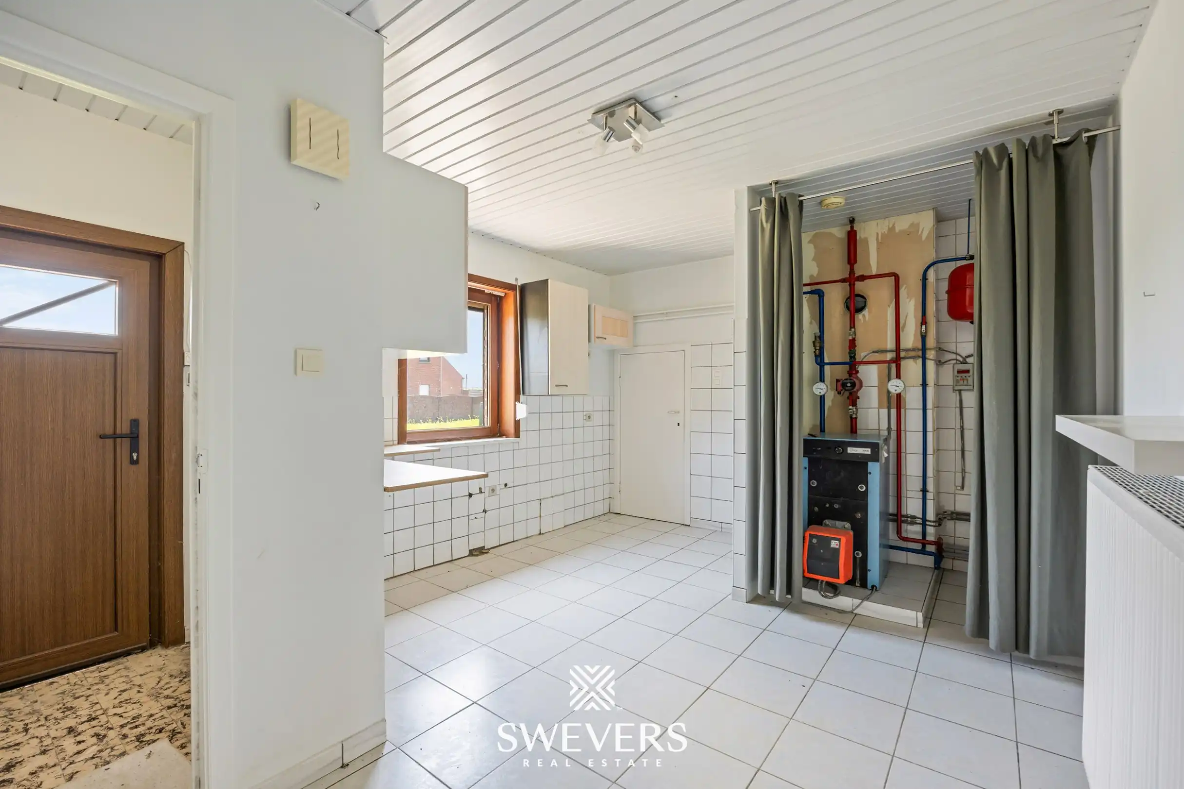 Vrijstaande woning met groot perceel en enorm renovatiepotentieel in Herk-de-Stad foto 22
