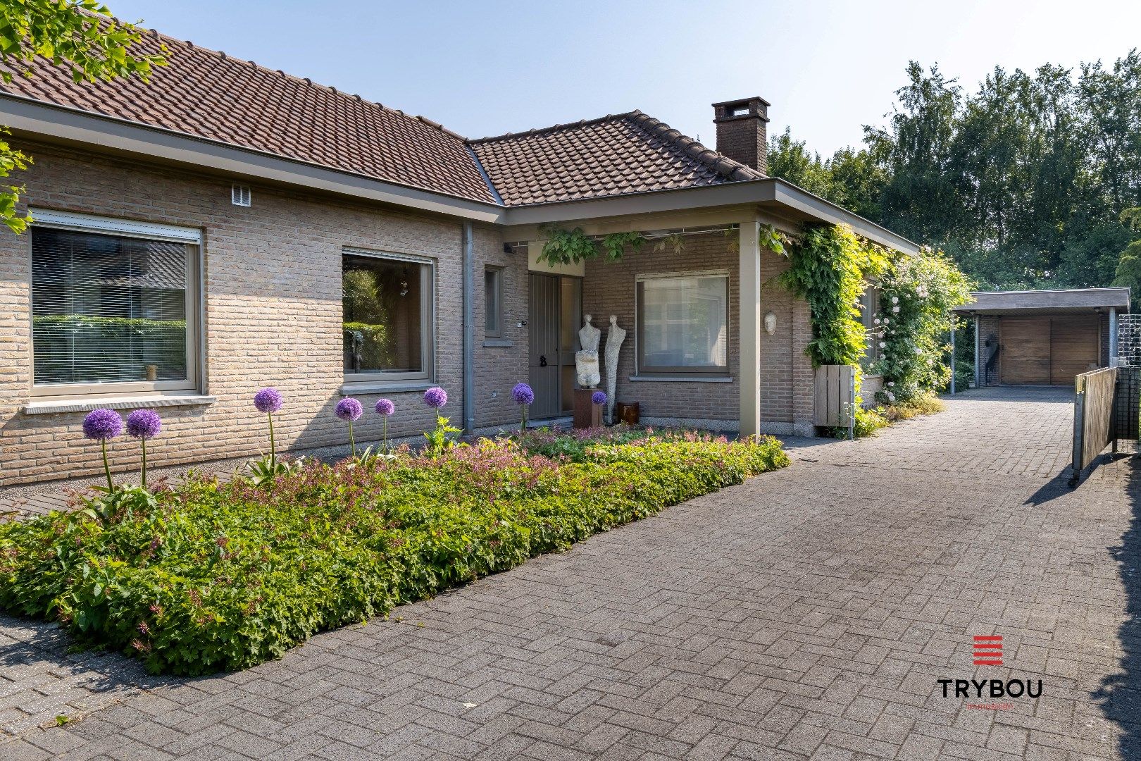 Unieke villa met atelier, aangelegde tuin en artistieke ziel foto 3