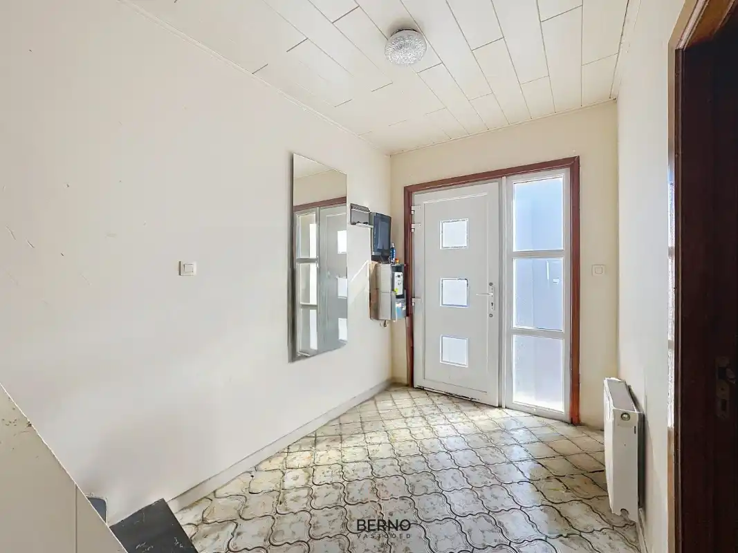 Te renoveren woning met 4 slaapkamers foto 3