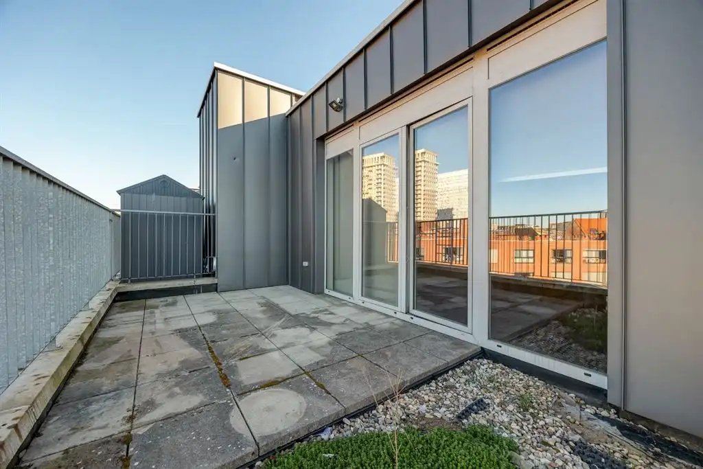 Recent appartement met groot zonneterras pal aan Park Spoor Noord foto 3