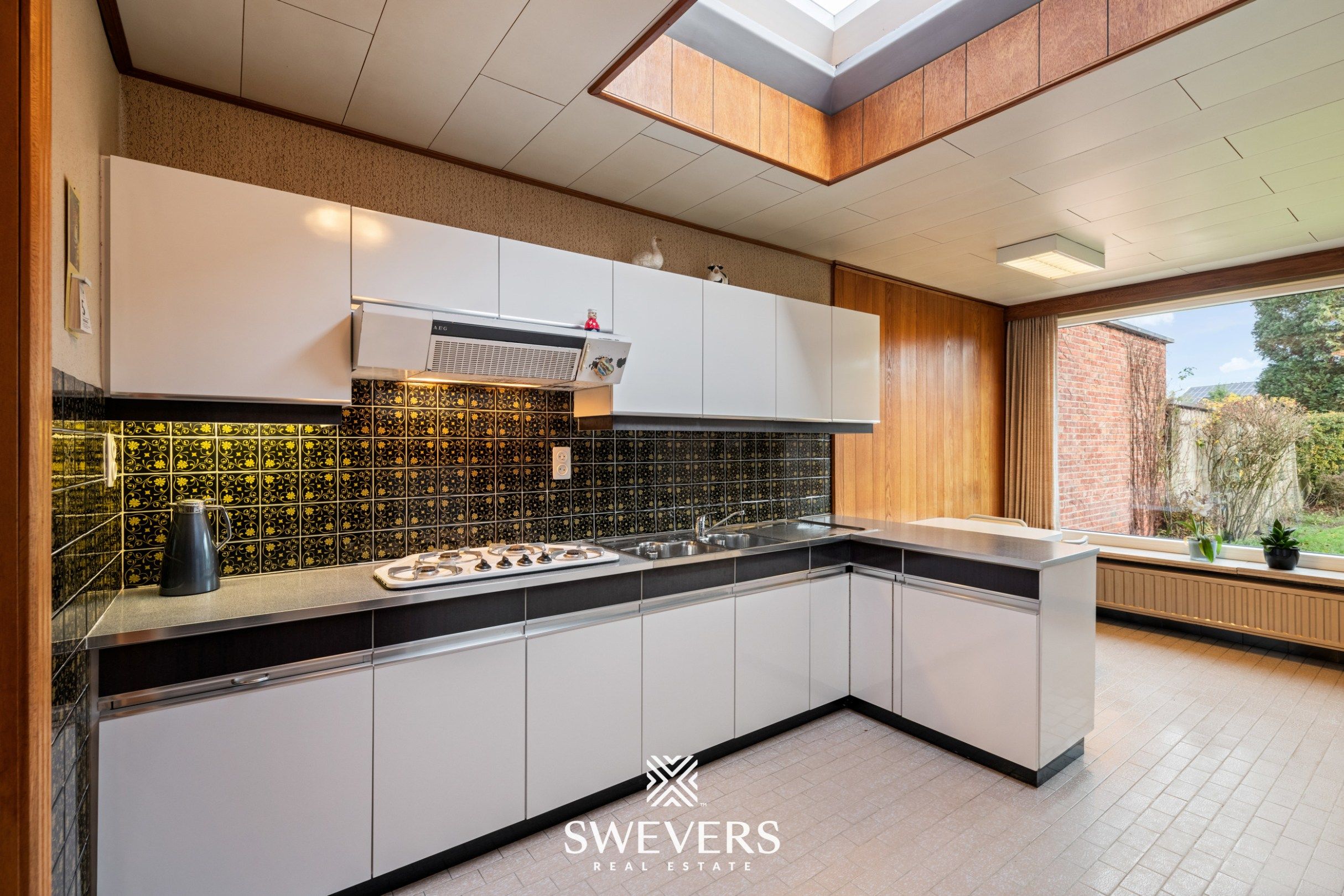 Woning met uitzonderlijk renovatiepotentieel op ruim en groen perceel nabij Zonhoven centrum foto 10