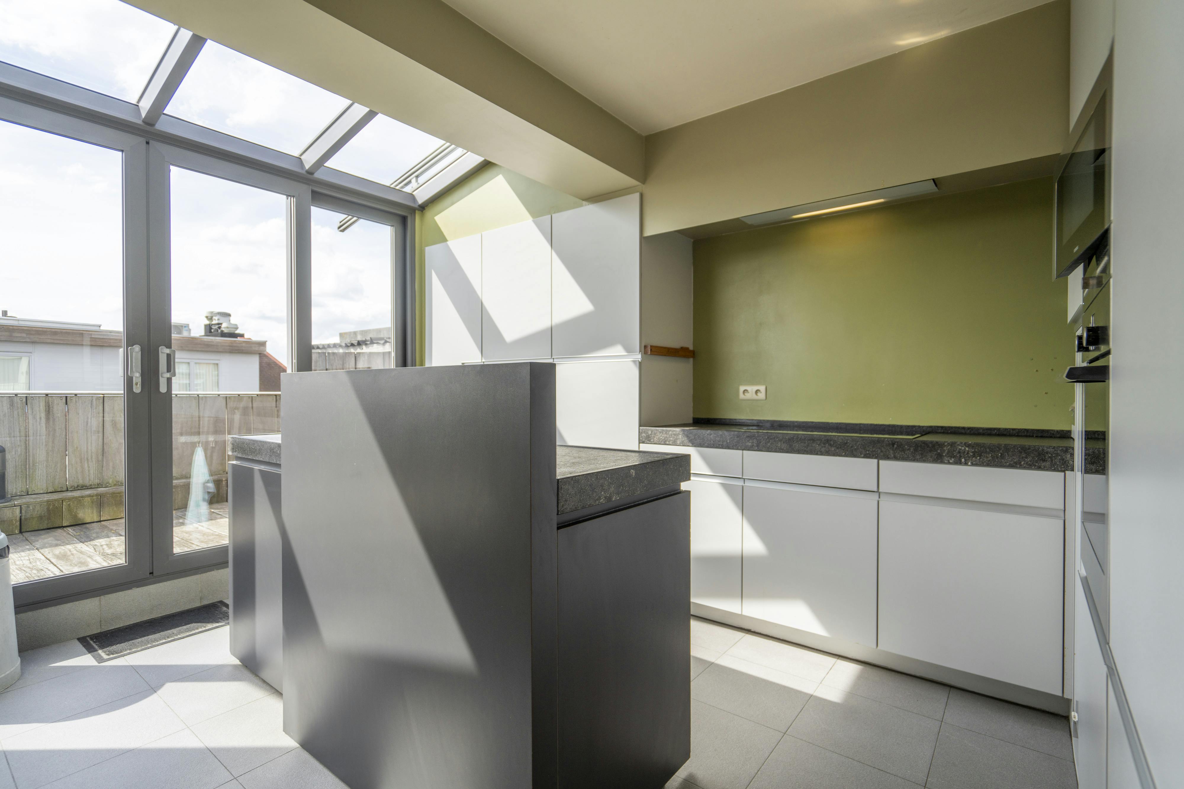 Penthouse (147m²) te koop in hartje Kortrijk! foto 10