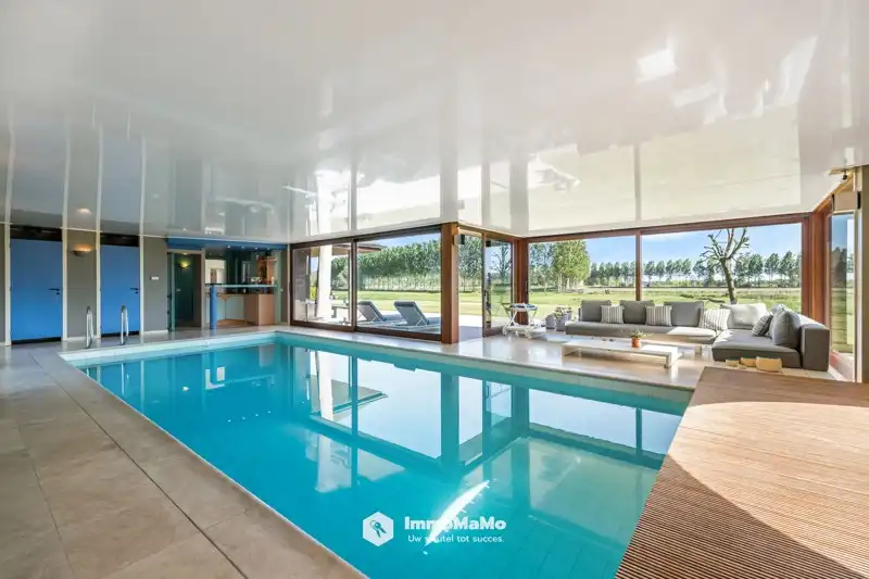 UNIEKE VILLA MET BINNENZWEMBAD EN PAARDENSTALLEN OP EEN TOPLOCATIE TE KOOP IN MENDONK (GENT) foto 19