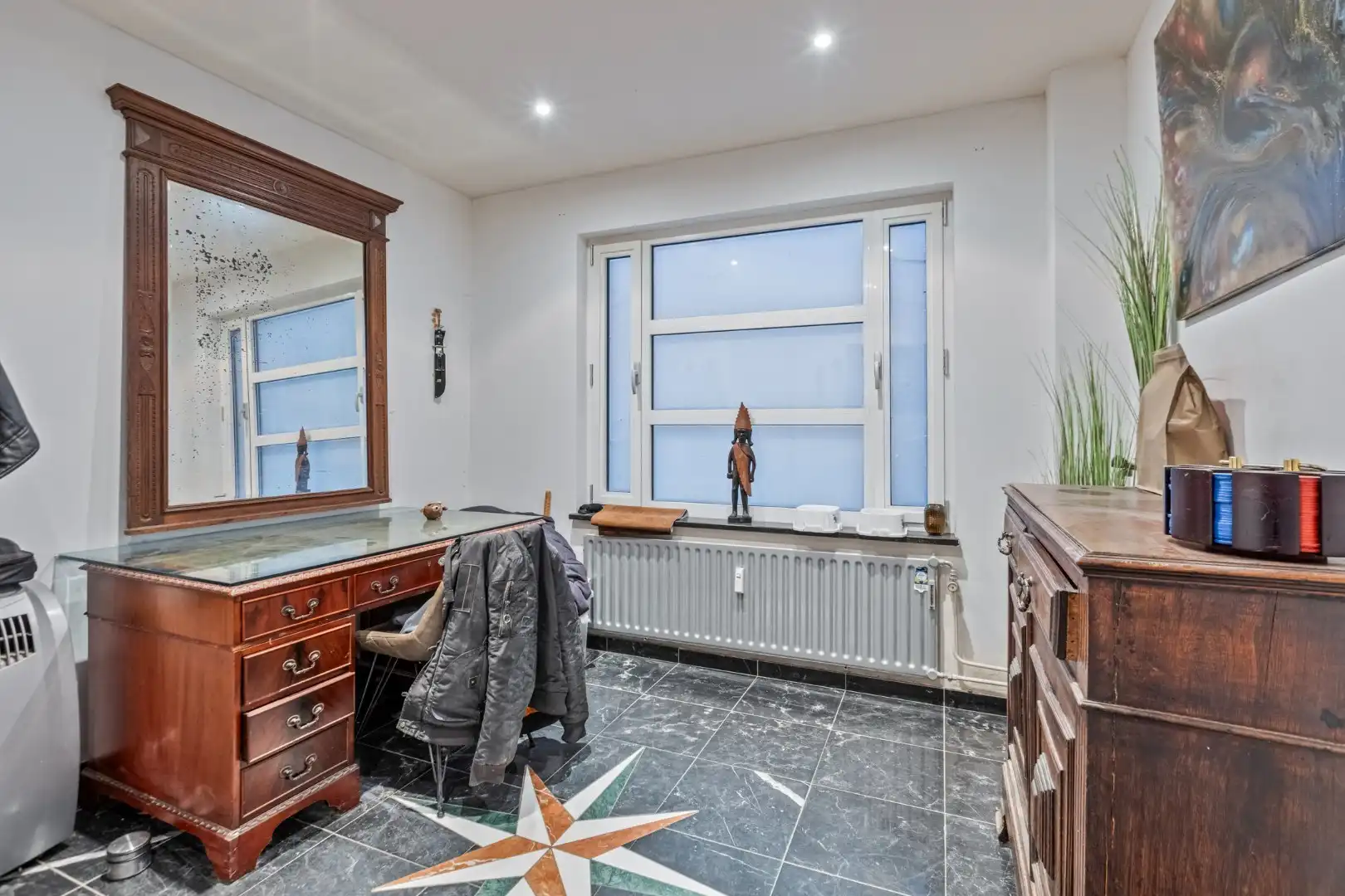 Ruim appartement gelegen op de 1ste verdieping in het centrum van Maaseik! foto 4