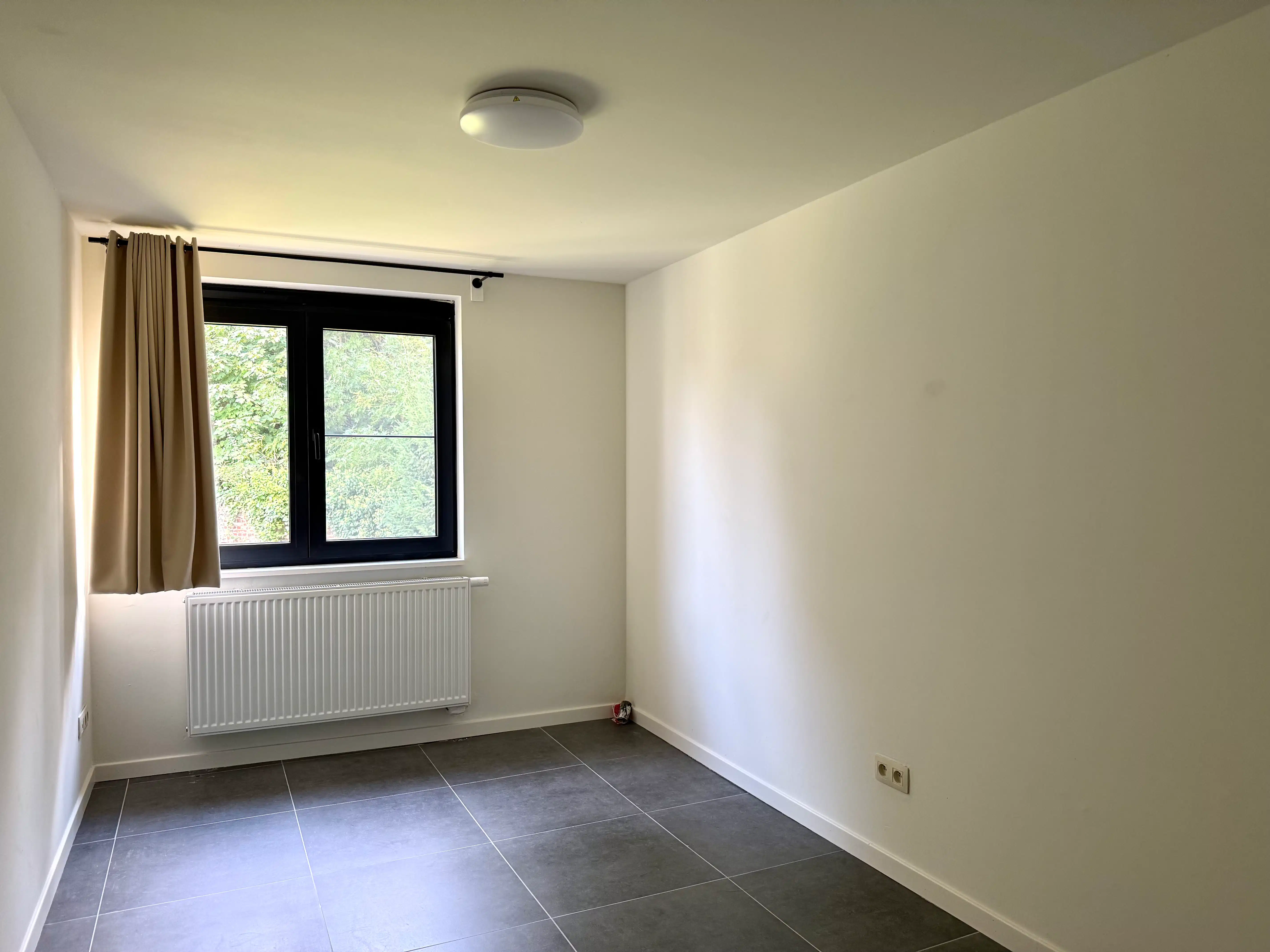 Ruim appartement met 4 slaapkamers en uitzonderlijk privatieve tuin foto 11