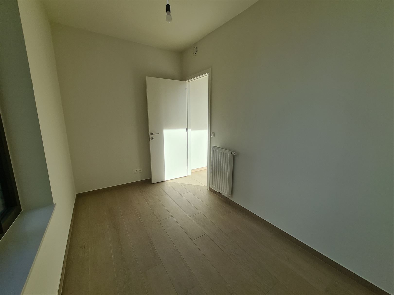 Licht nieuwbouw appartement in toffe wijk foto 11