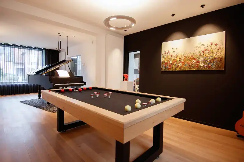 Knap afgewerkte, energiezuinige en ruime woning met vier slaapkamers, guesthouse/praktijkruimte op een centrale (maar toch bosrijke!) locatie te As foto 7