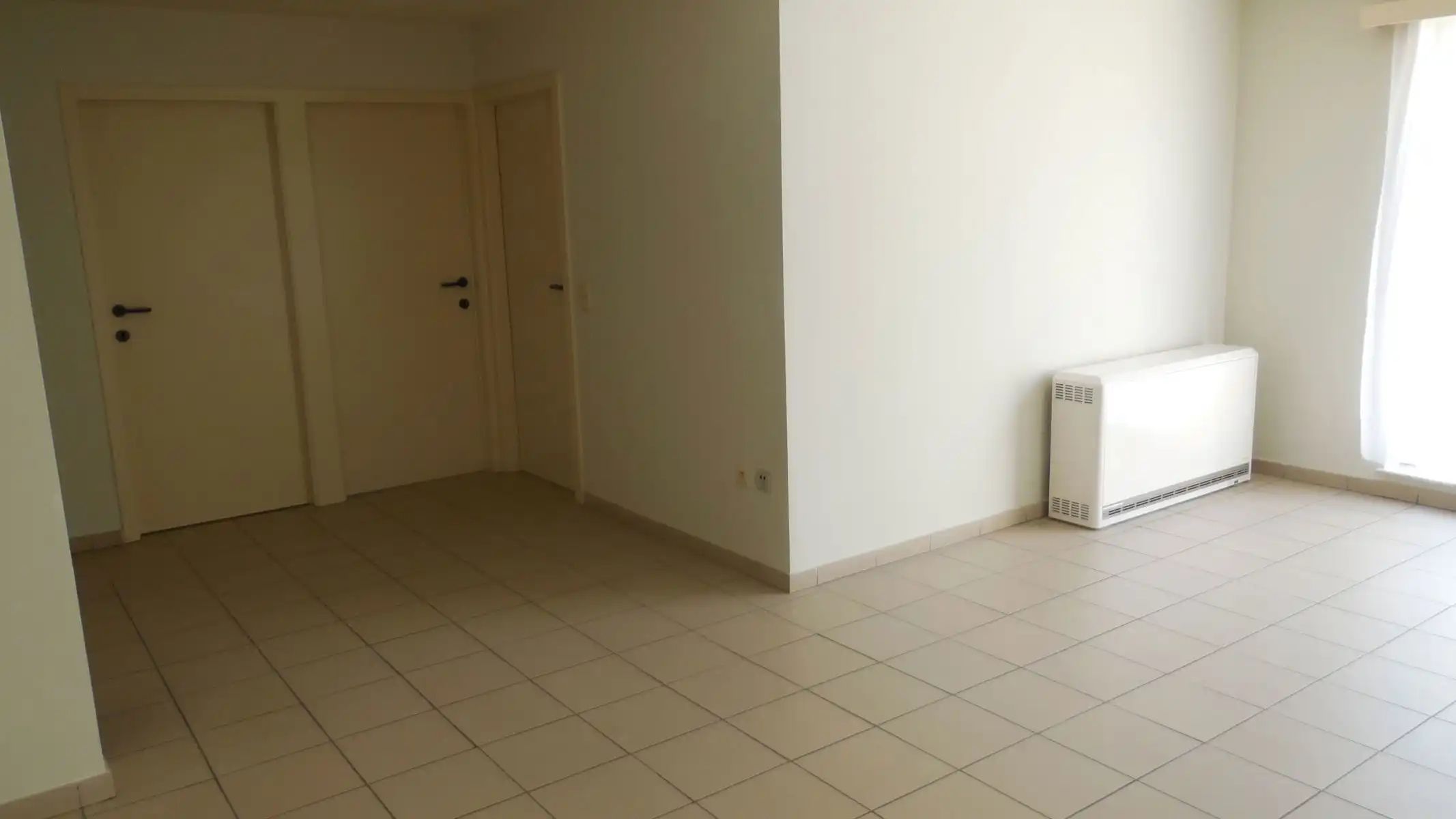 Gelijkvloers appartement met 2 slaapkamers en een aangenaam terras. foto 2