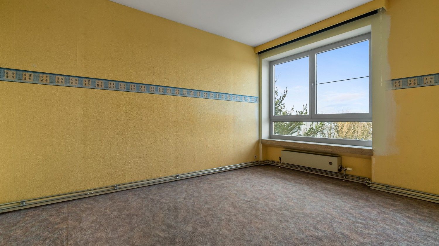 Ruim en lichtrijk appartement met 3 slaapkamers, kelder en autostaanplaats foto 11