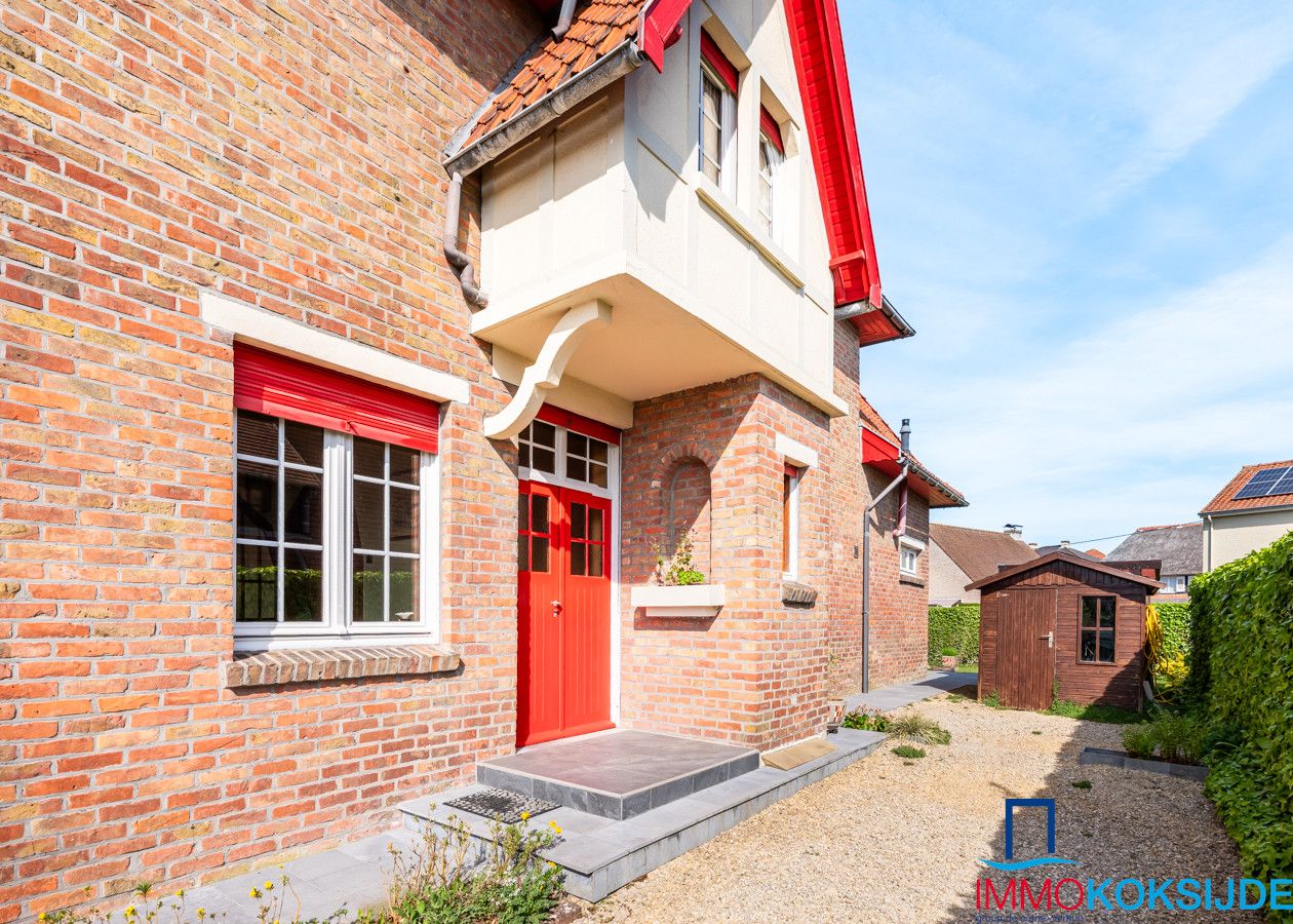 Rustig gelegen koppelwoning met 4 slaapkamers en zonnige tuin foto 3