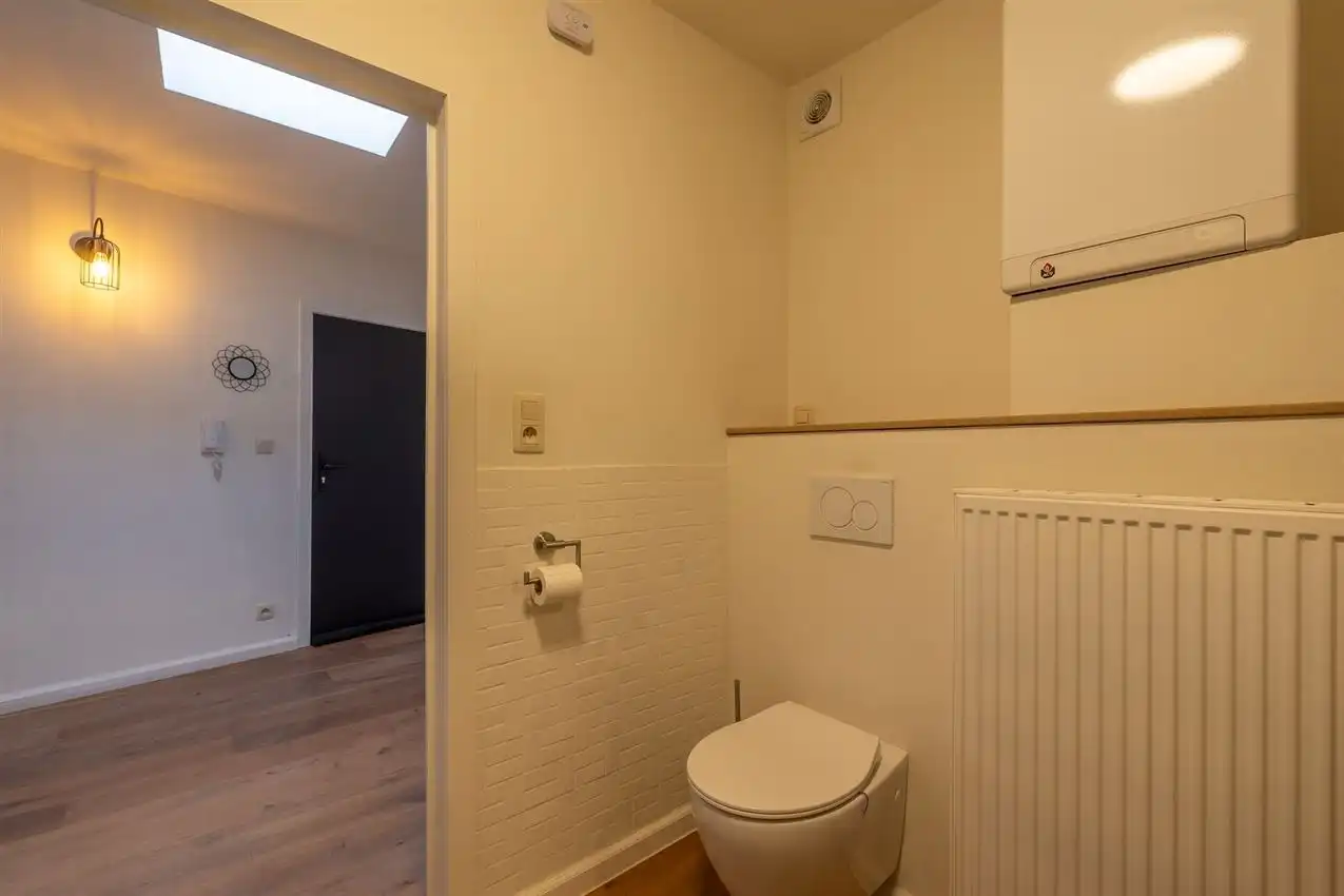Instapklaar, volledig gerenoveerd appartement met twee terrassen foto 25