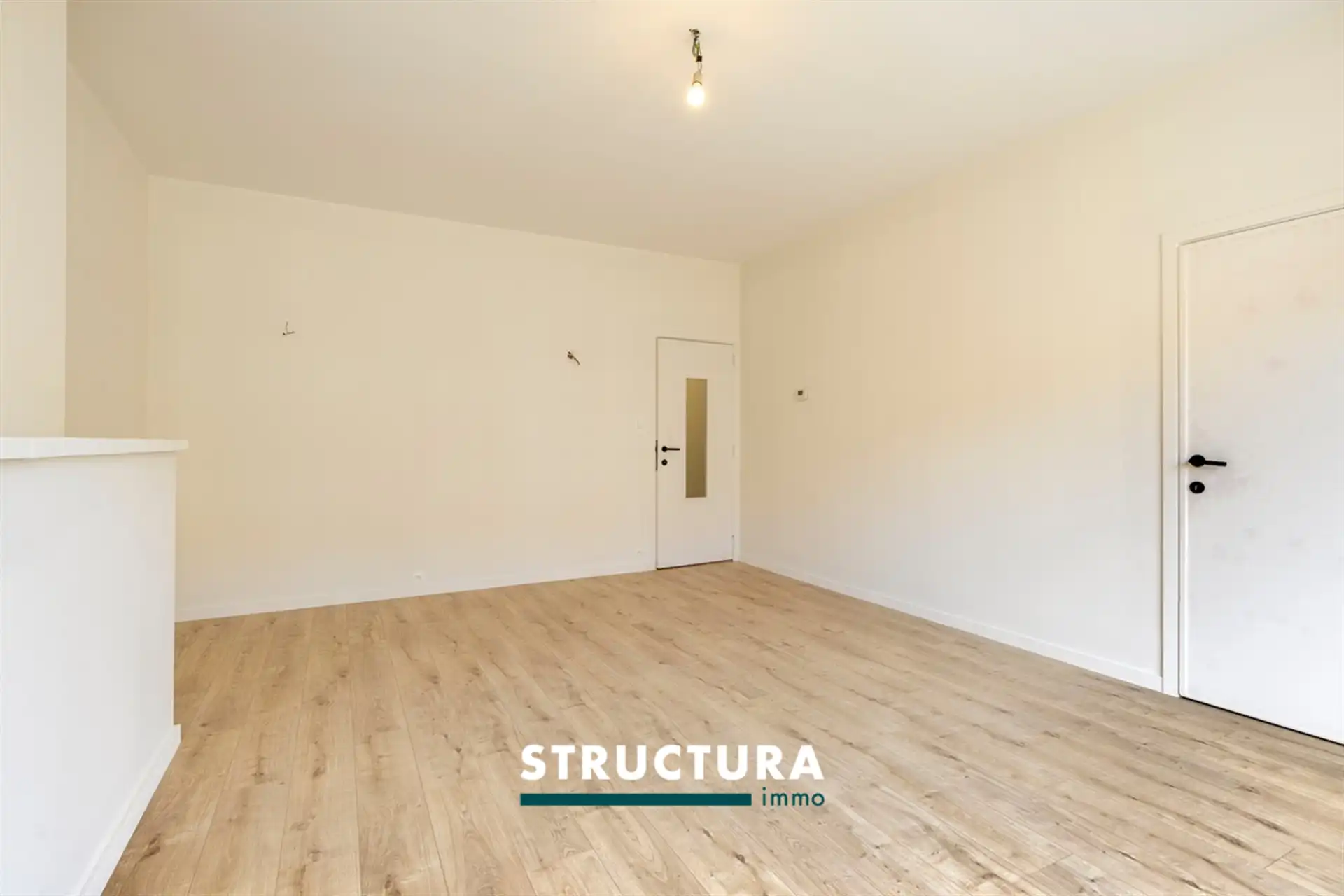 Gerenoveerd appartement met tuin op centrale ligging foto 4
