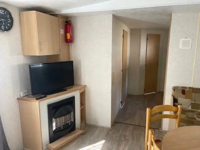 Stacaravan te Zilverstrand voor 8 personen met tuinhuis en terras. foto 5