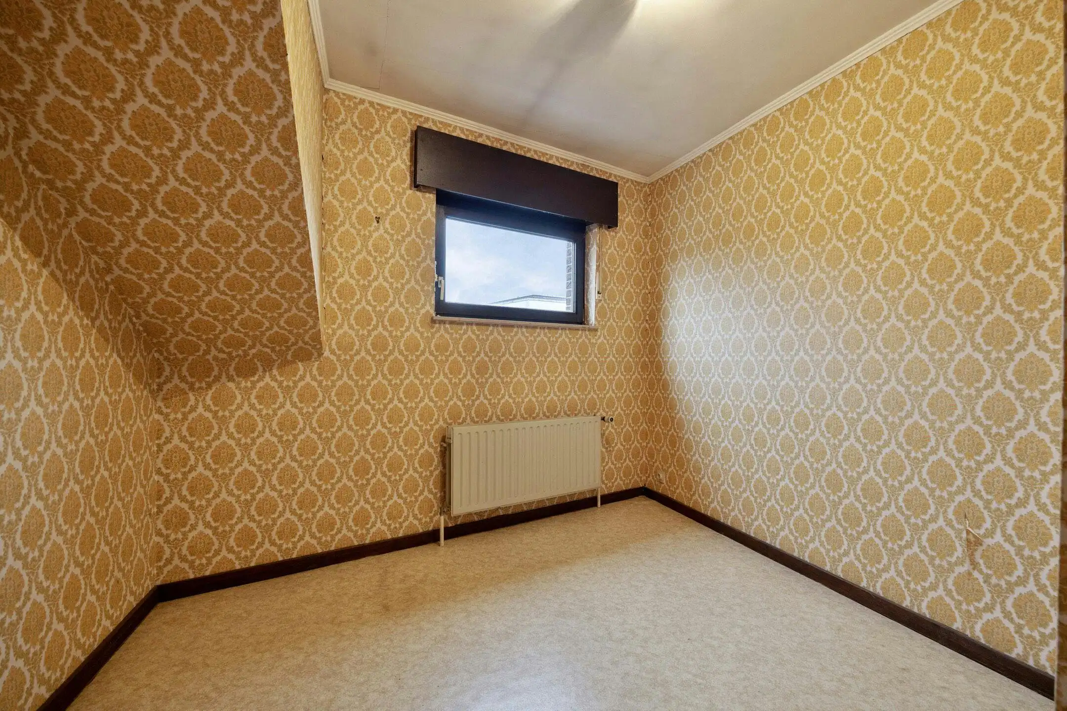 Op te frissen gezinswoning met inpandige garage en tuin op toplocatie in Strombeek! foto 16