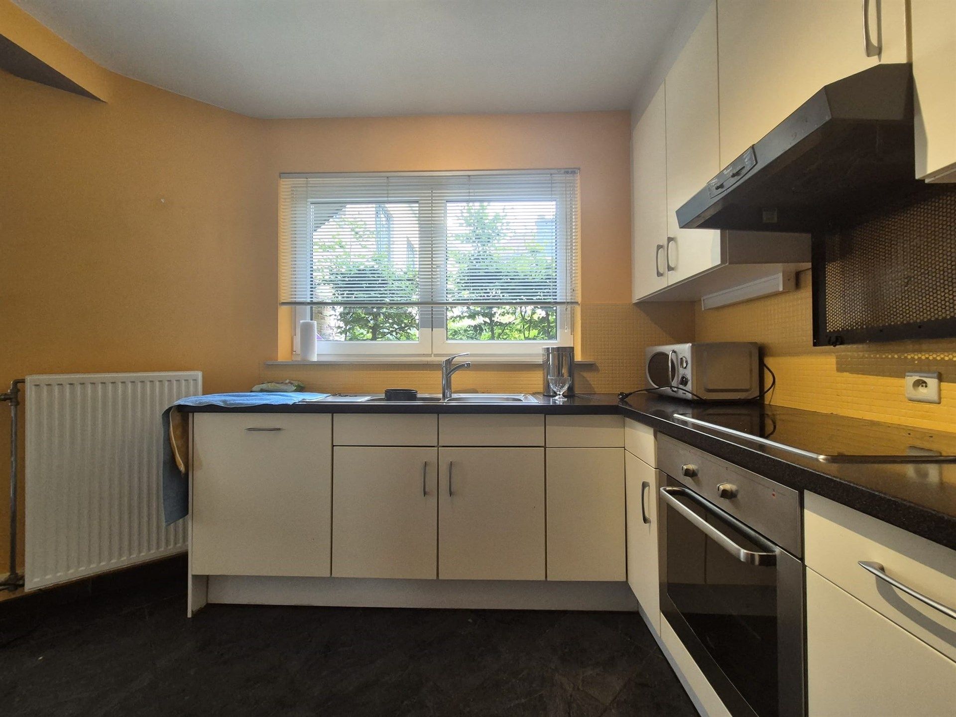 Gunstig gelegen gelijkvloers 1-slaapkamerappartement in Heusden foto 9