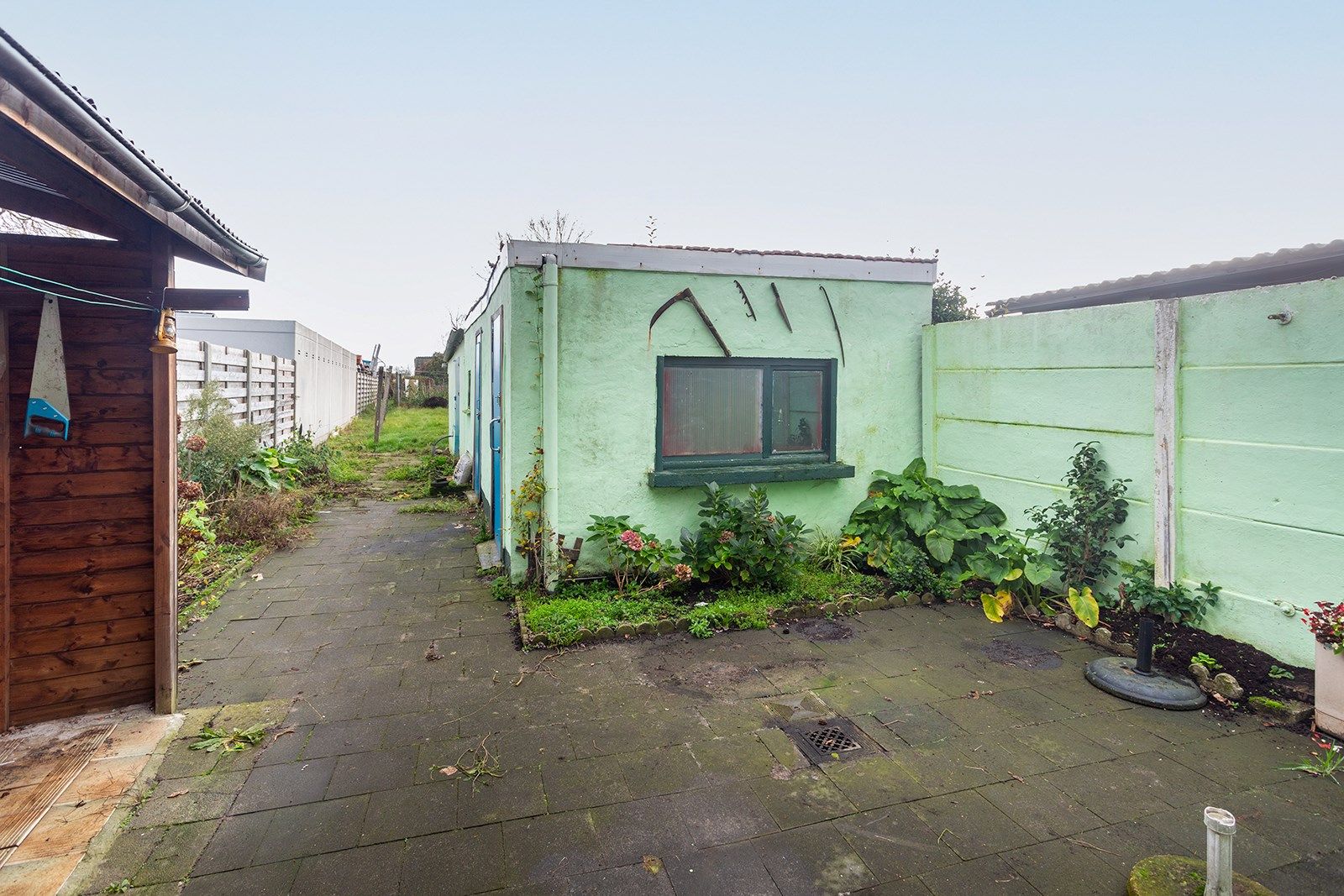 Goed gelegen te renoveren woning met zuid-oost tuin foto 6