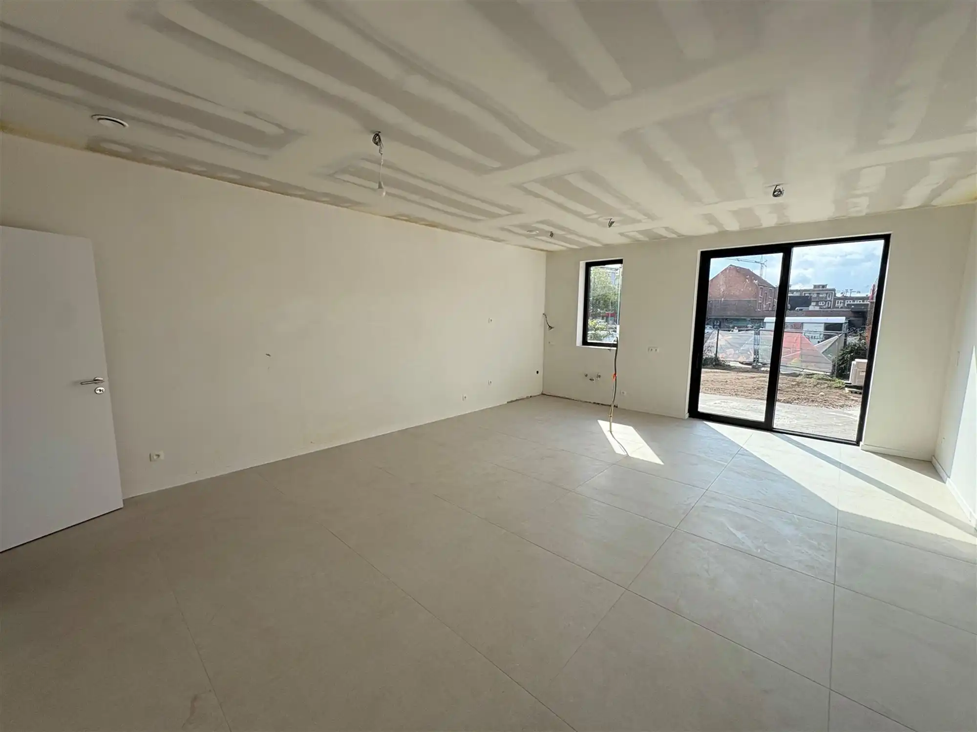 Nieuwbouwappartement met 1 slaapkamer en grote tuin. foto 16