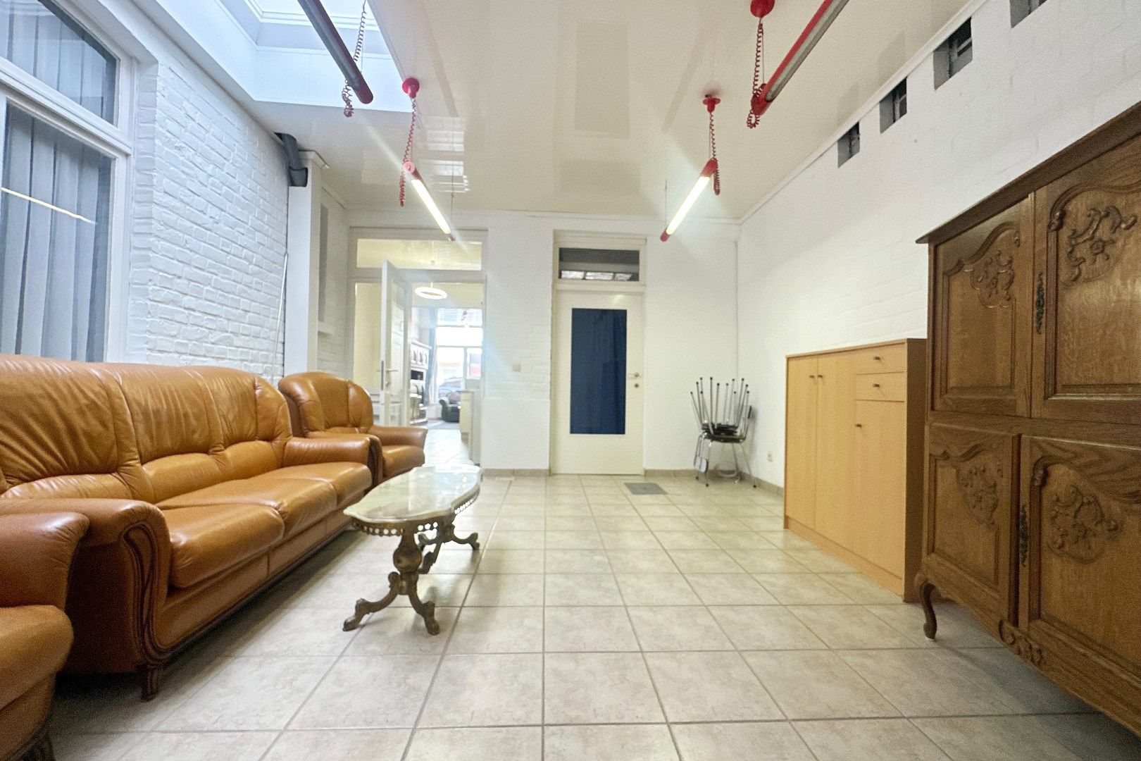 Prachtige interbellumwoning onderverdeeld in drie ruime appartementen foto 6