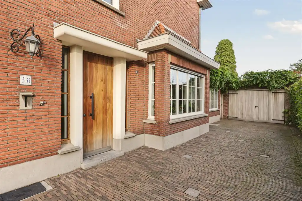 Charmante halfopen woning met grote tuin te Turnhout foto 33
