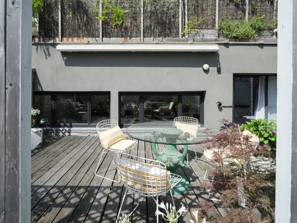 Imposant designappartement met loftallures nabij het Wintercircus en De Krook foto 5