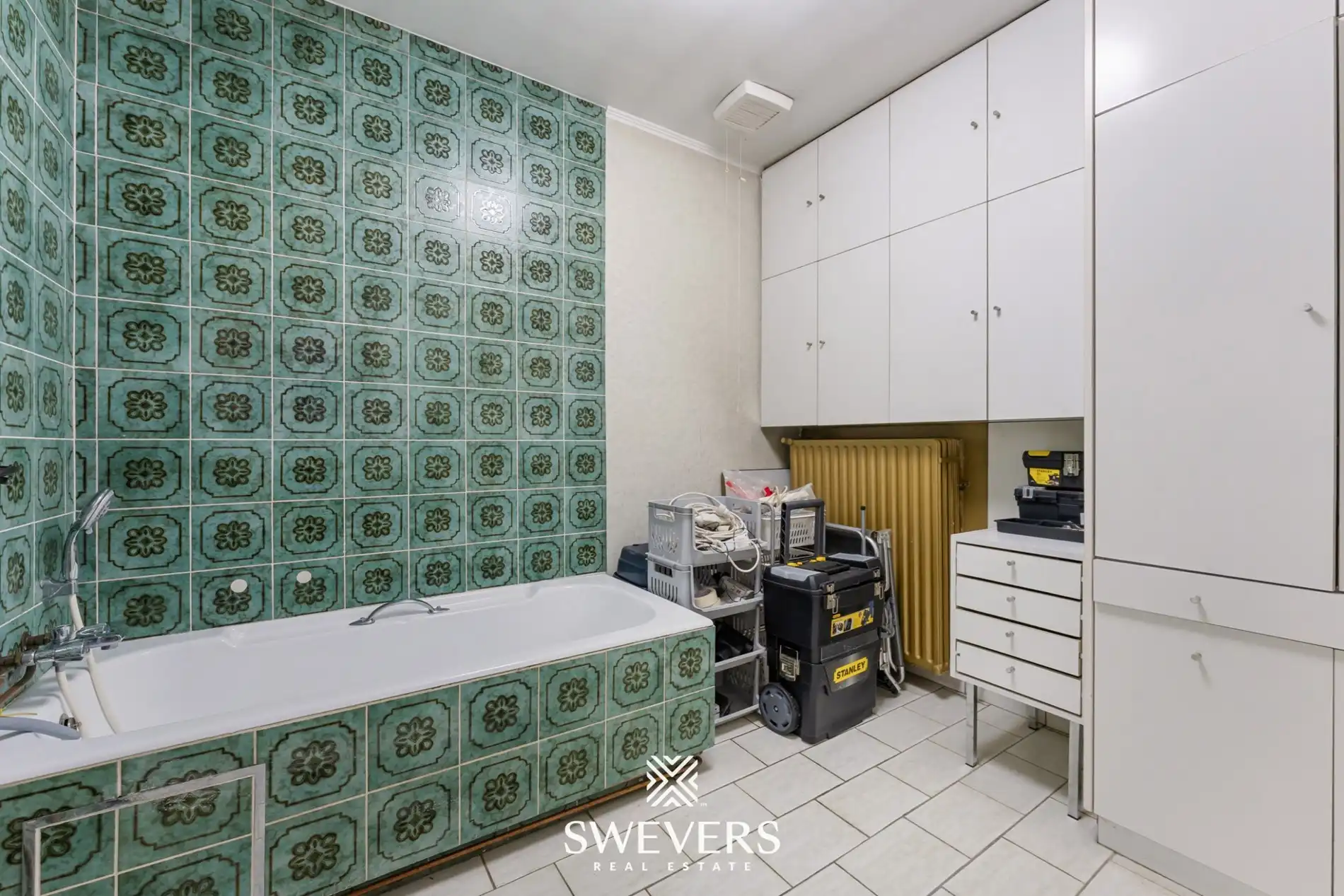 Opbrengsteigendom met handelspand, ruim appartement en uitbreidingspotentieel in hartje Heusden-Zolder foto 28