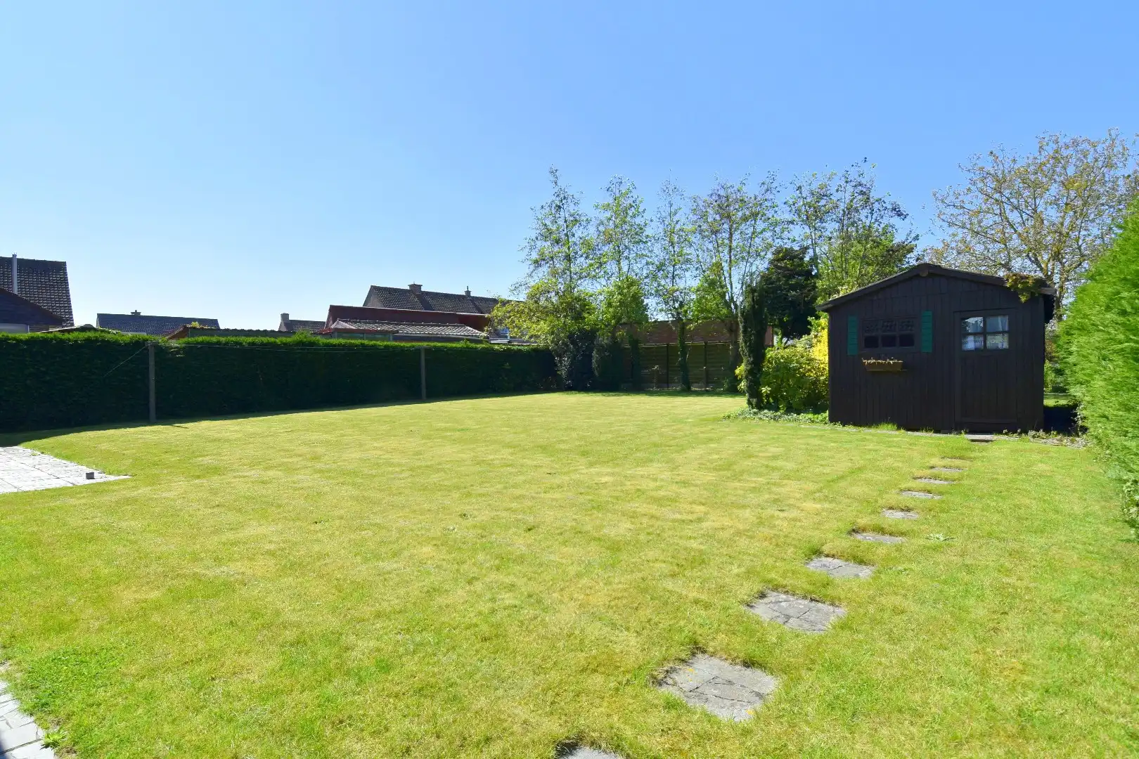 Ruime alleenstaande woning met 2 slaapkamers (mogelijkheid tot meer!), garage en zonnige tuin te koop in Gullegem foto 13