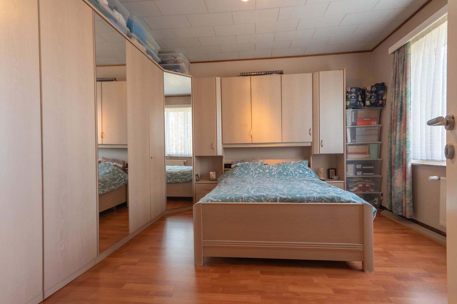 Goed onderhouden woning met 4 slaapkamers en leuke tuin foto 11