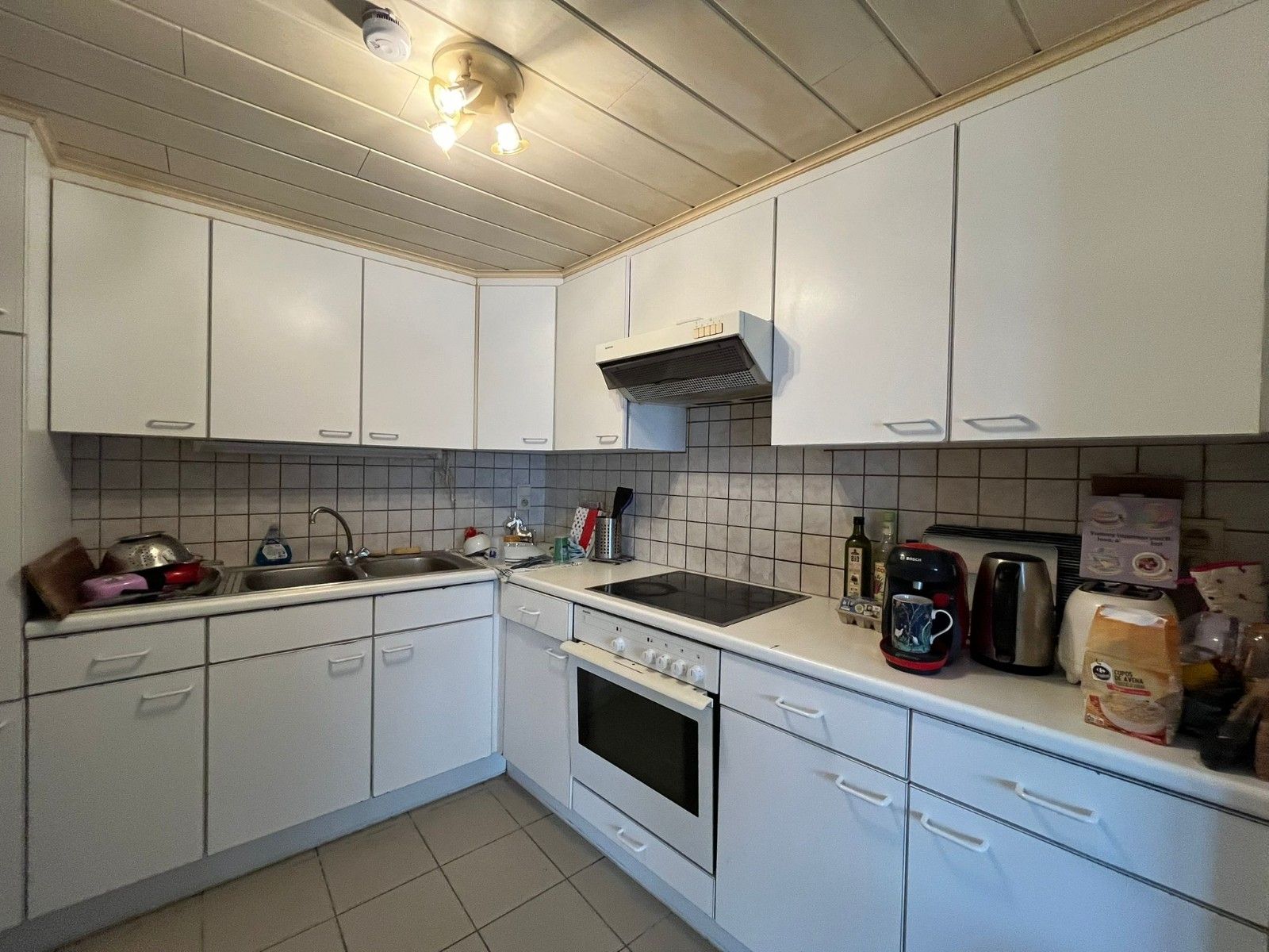 TE HUUR – Gelijkvloersappartement met garage foto 6