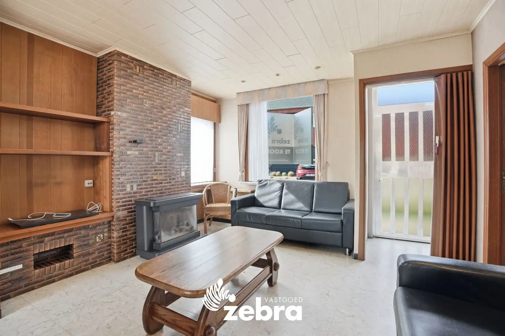 Te renoveren woning met garage op ruim perceel te Pittem! foto 2
