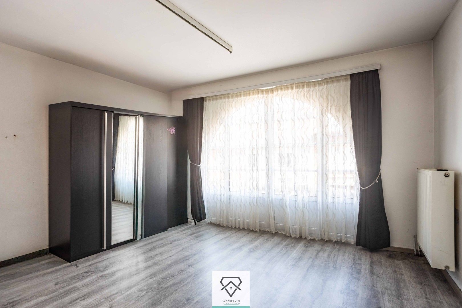 Ruim handelshuis met duplexappartement en twee handelsruimtes te koop foto 27