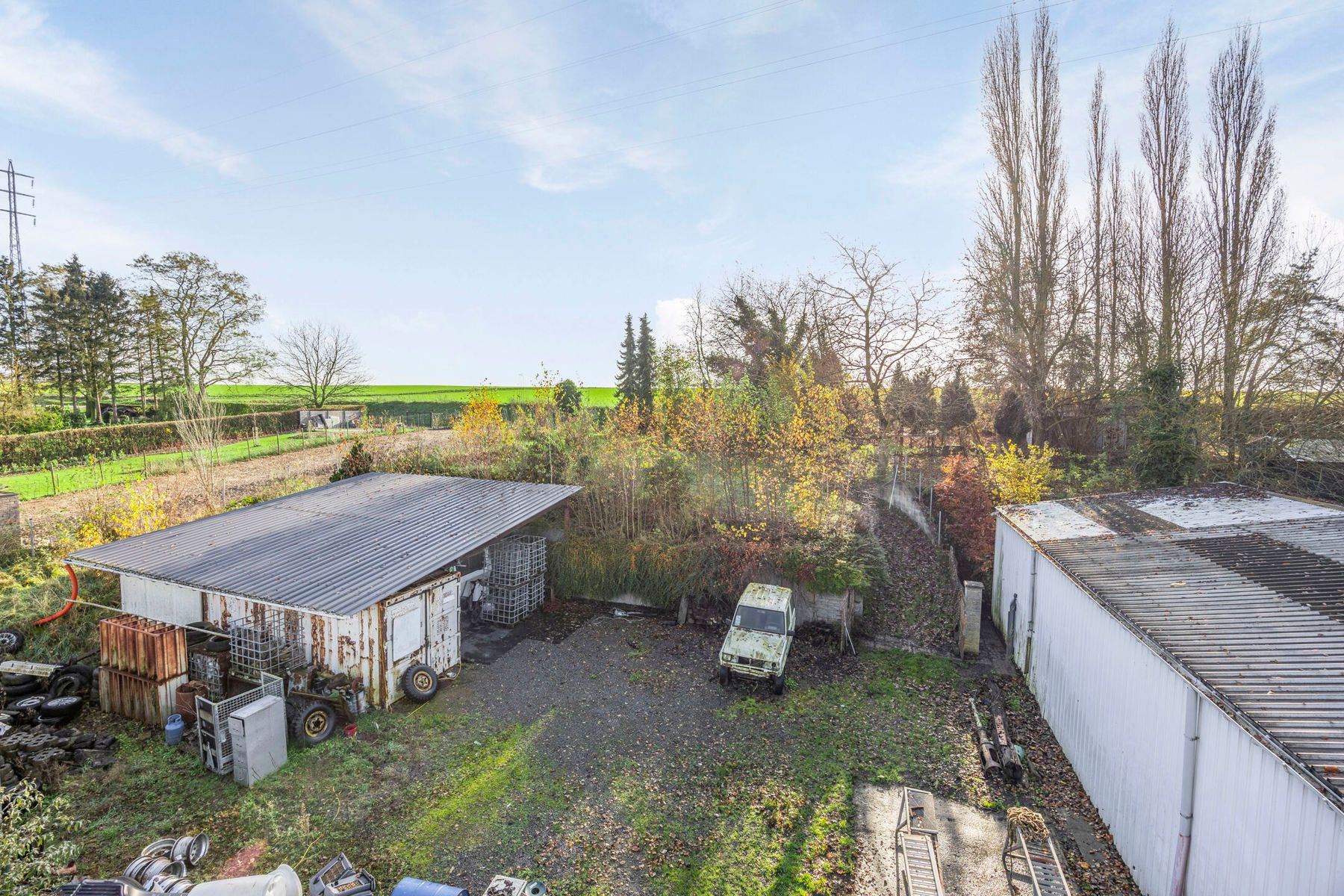 Handelspand met appartement woonst, toonzaal/showroom, atelier/loods en bouwgrond foto 24