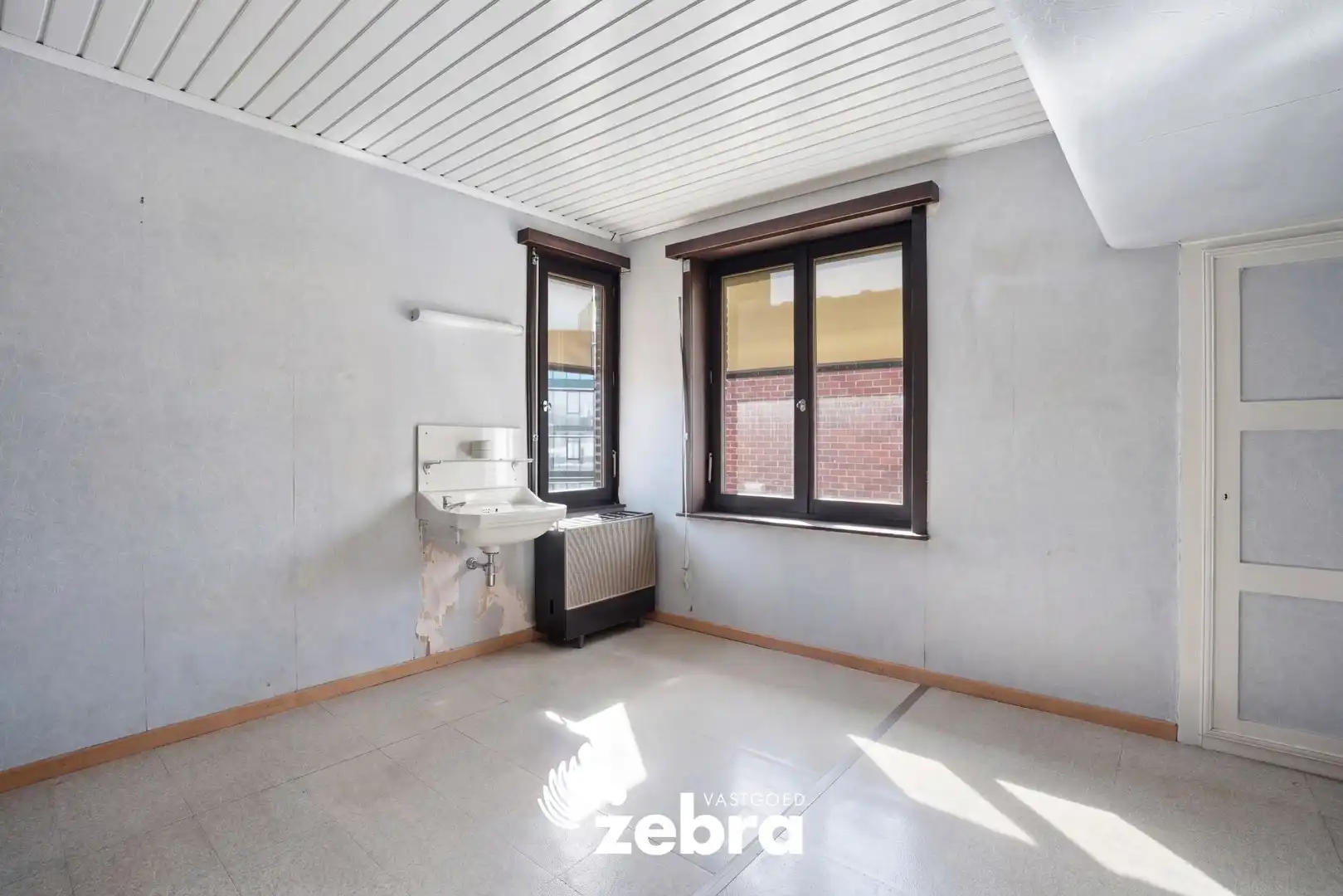 Op te frissen woning met veel potentieel, tuin en garage nabij het centrum van Tielt! foto 18