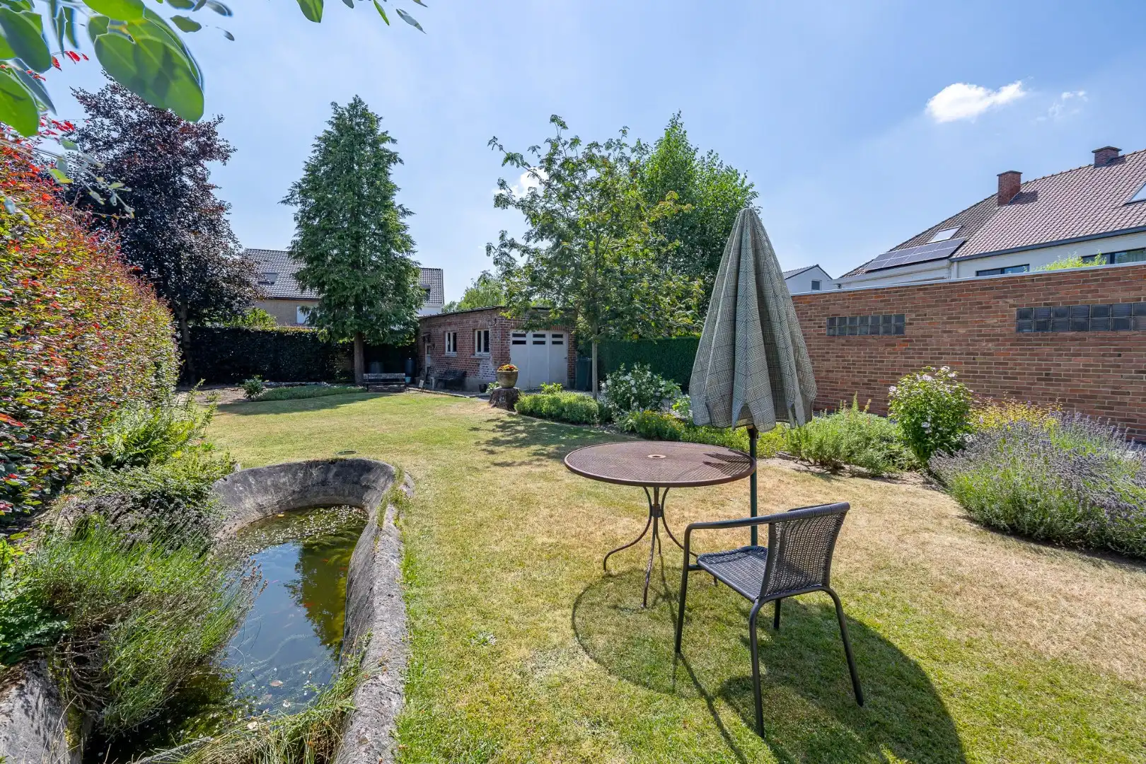 Ruime halfopen woning met 3 slaapkamers, garage en zuidgerichte tuin in Kuurne foto 14