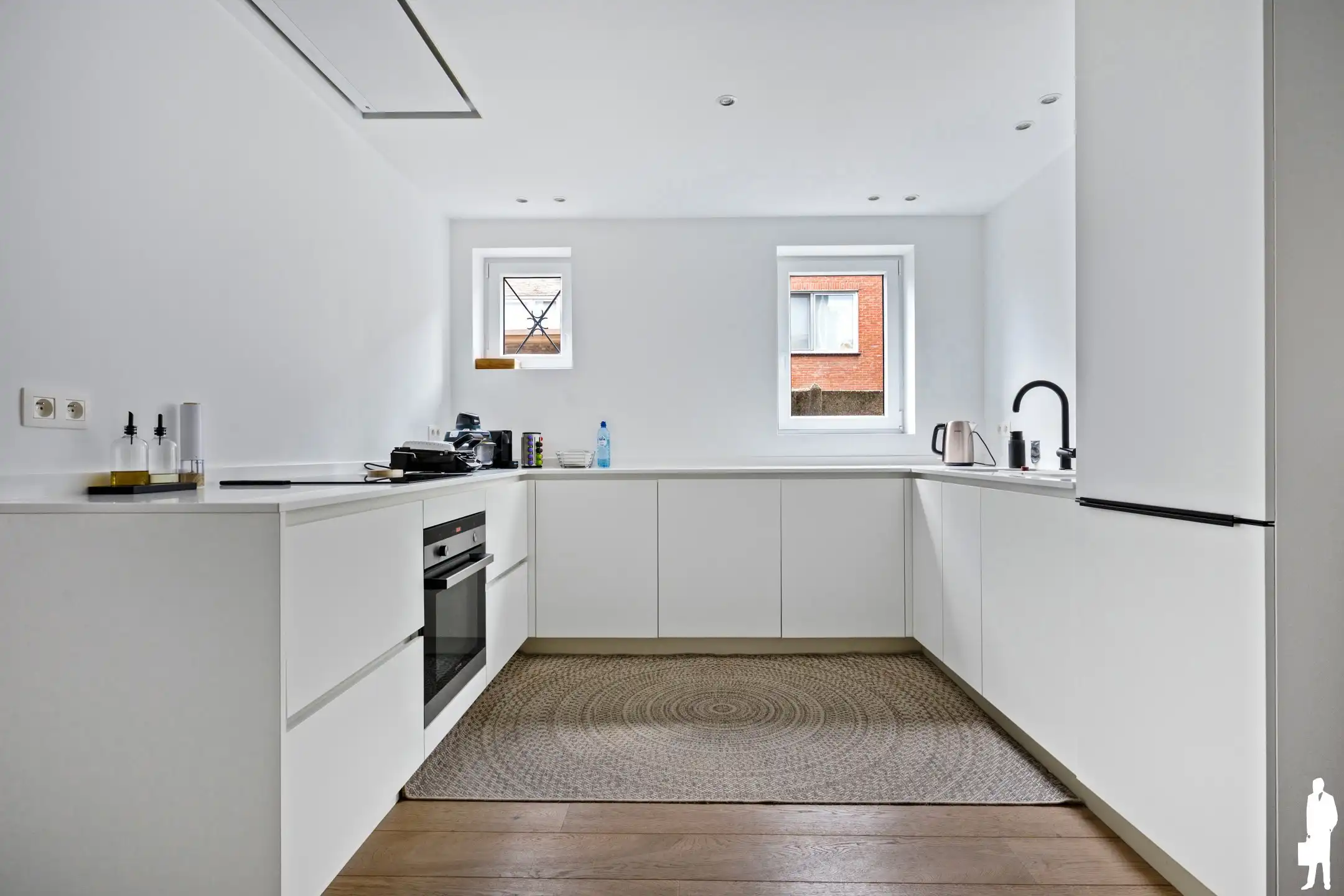Lichtrijk gerenoveerd gelijkvloers appartement met garage  foto 8