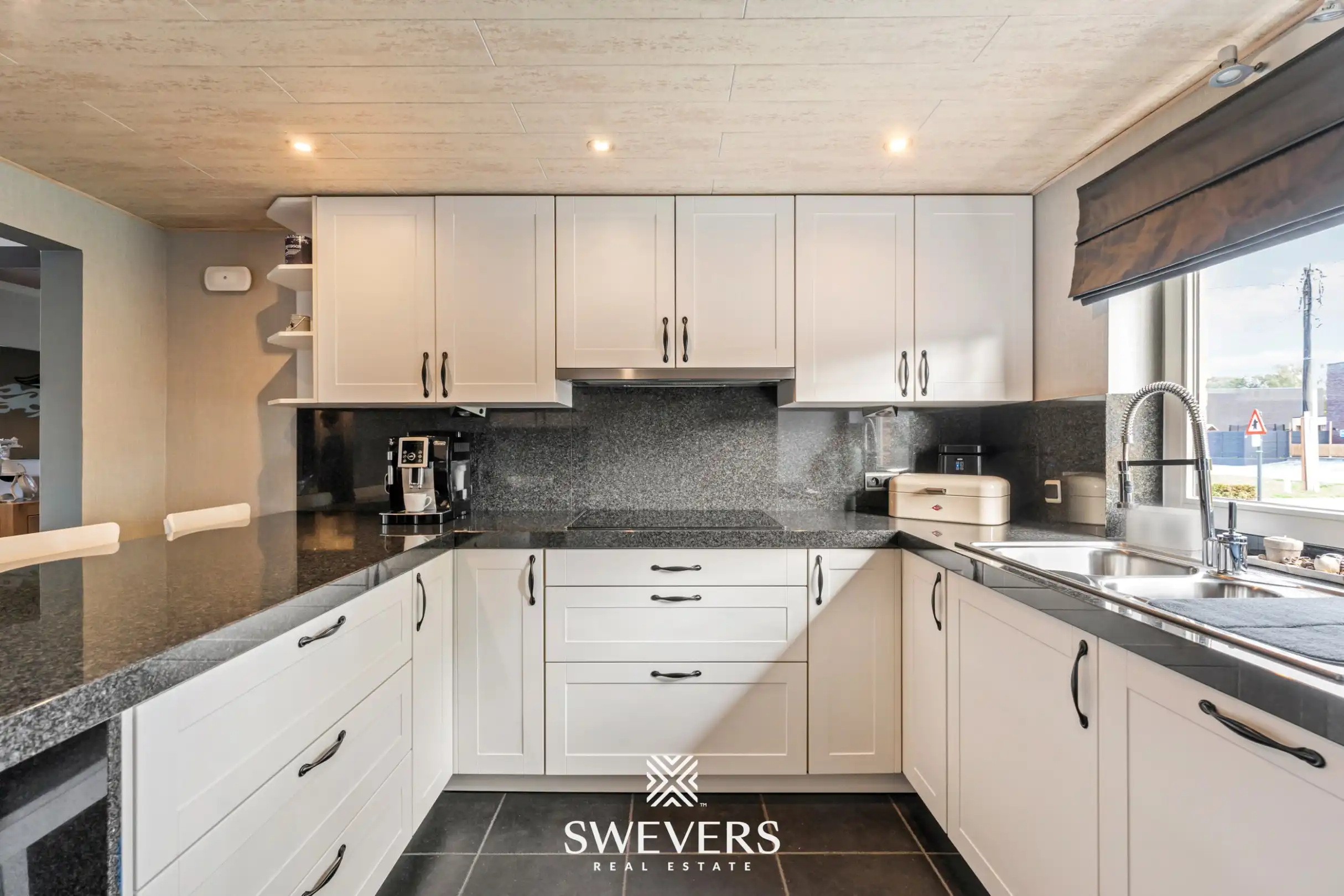 Gelijkvloerse, instapklare woning met grote tuin op rustige locatie te Koersel foto 8