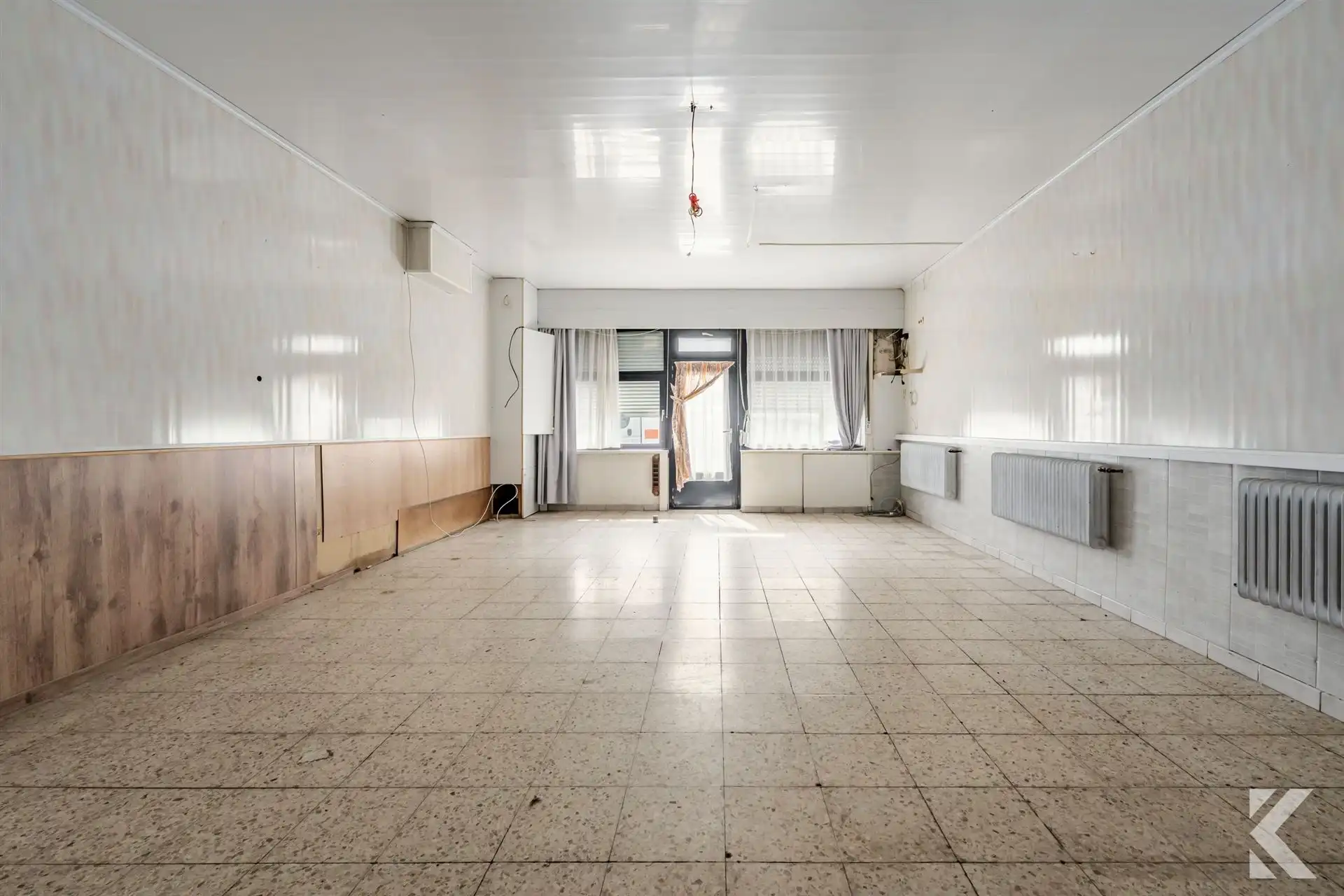 Te renoveren woning met veel potentieel en ruime zolder foto 4