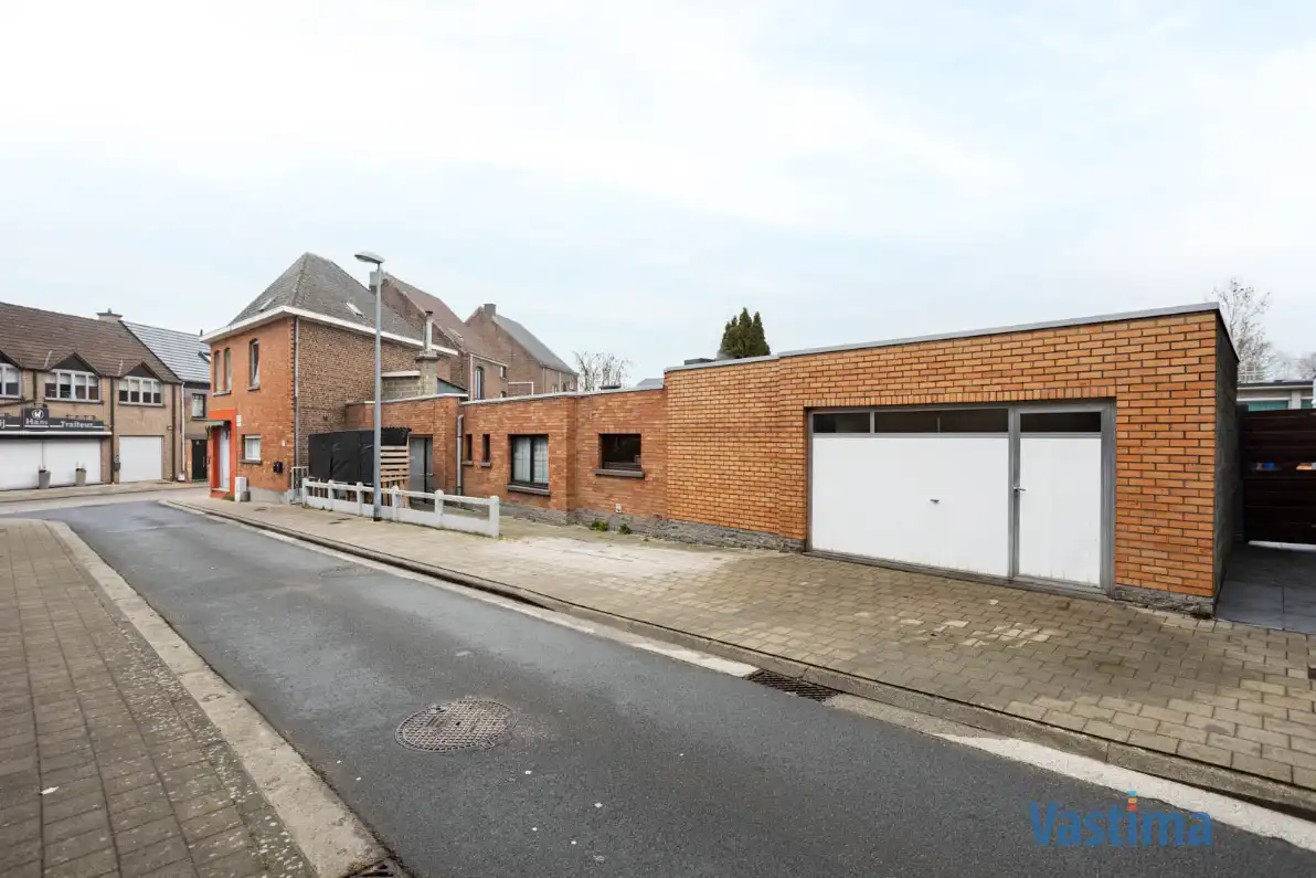 Handelspand met (dubbele)woonst, garage en buitenruimte foto 2