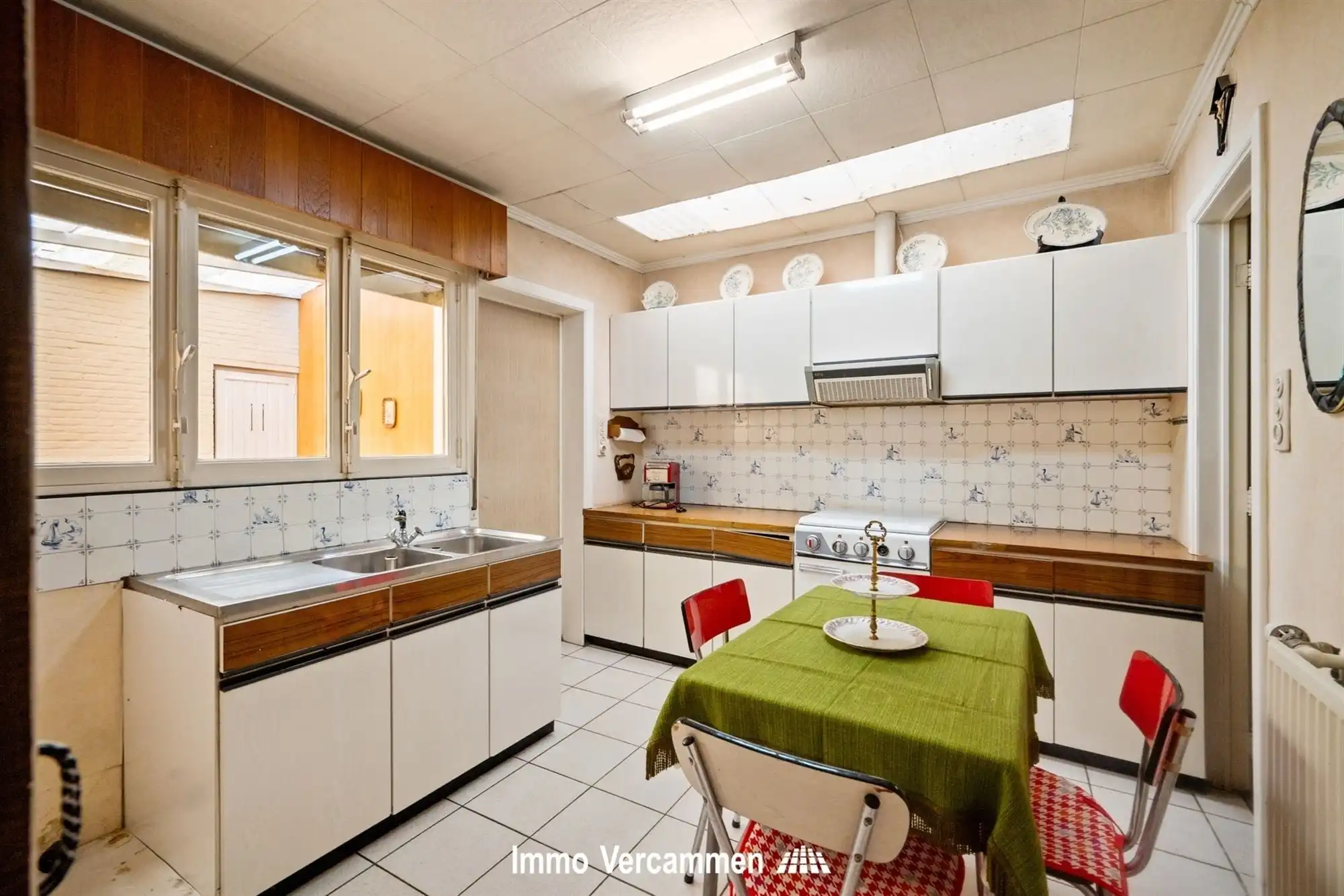 Te renoveren woning met commerciële ruimte in Schriek foto 6