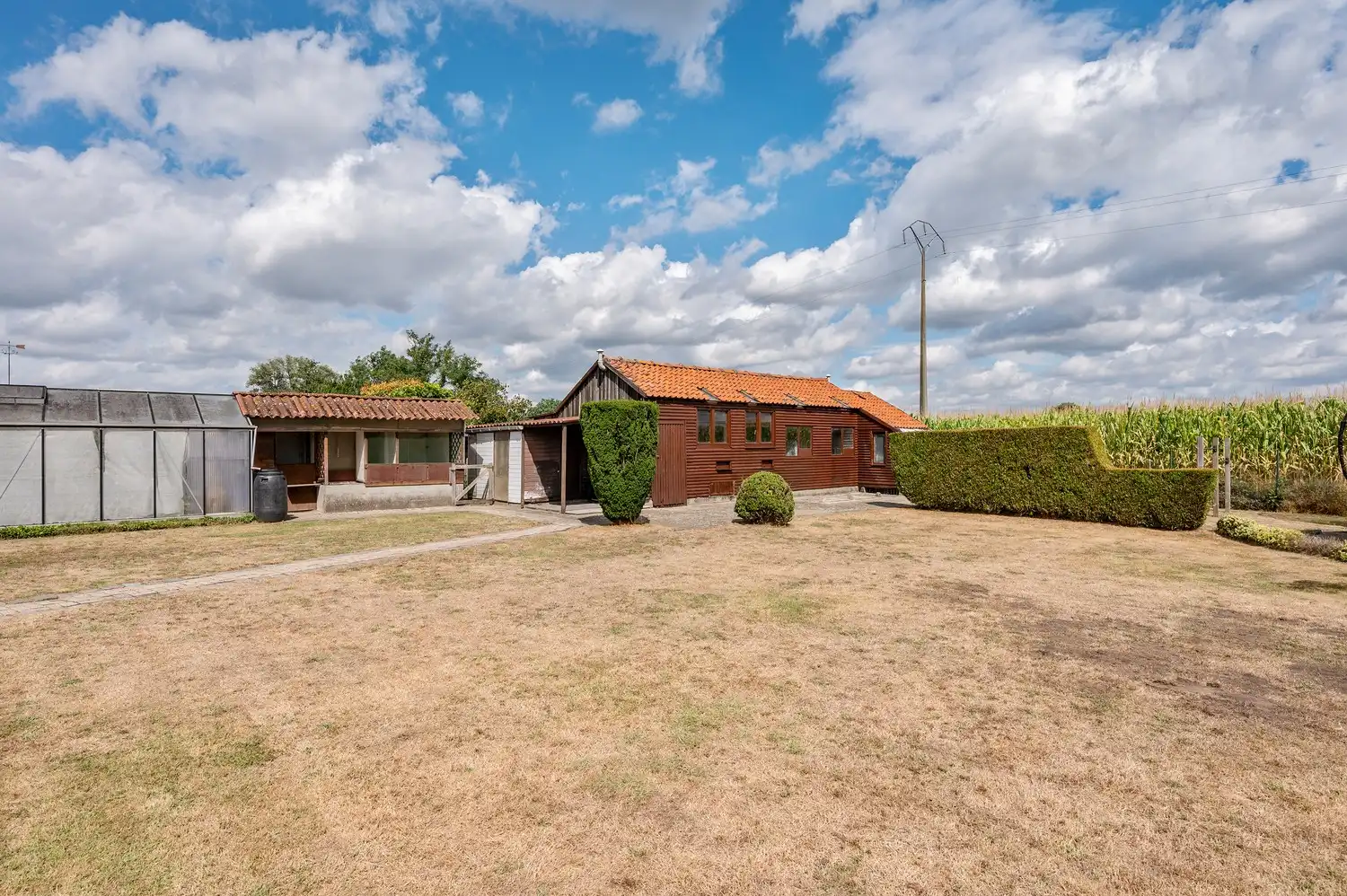 Instapklare open bebouwing op een ruim perceel van 1.185 m², landelijk gelegen met een prachtig vrij uitzicht aan de achterzijde. foto 36