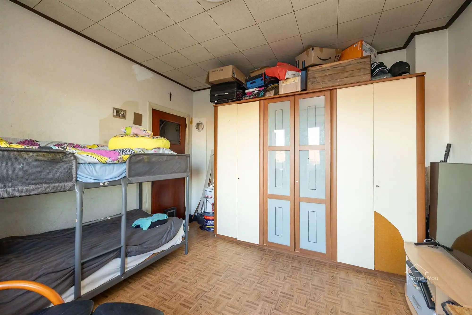 Op te frissen woning met zéér ruime extra zolder foto 13