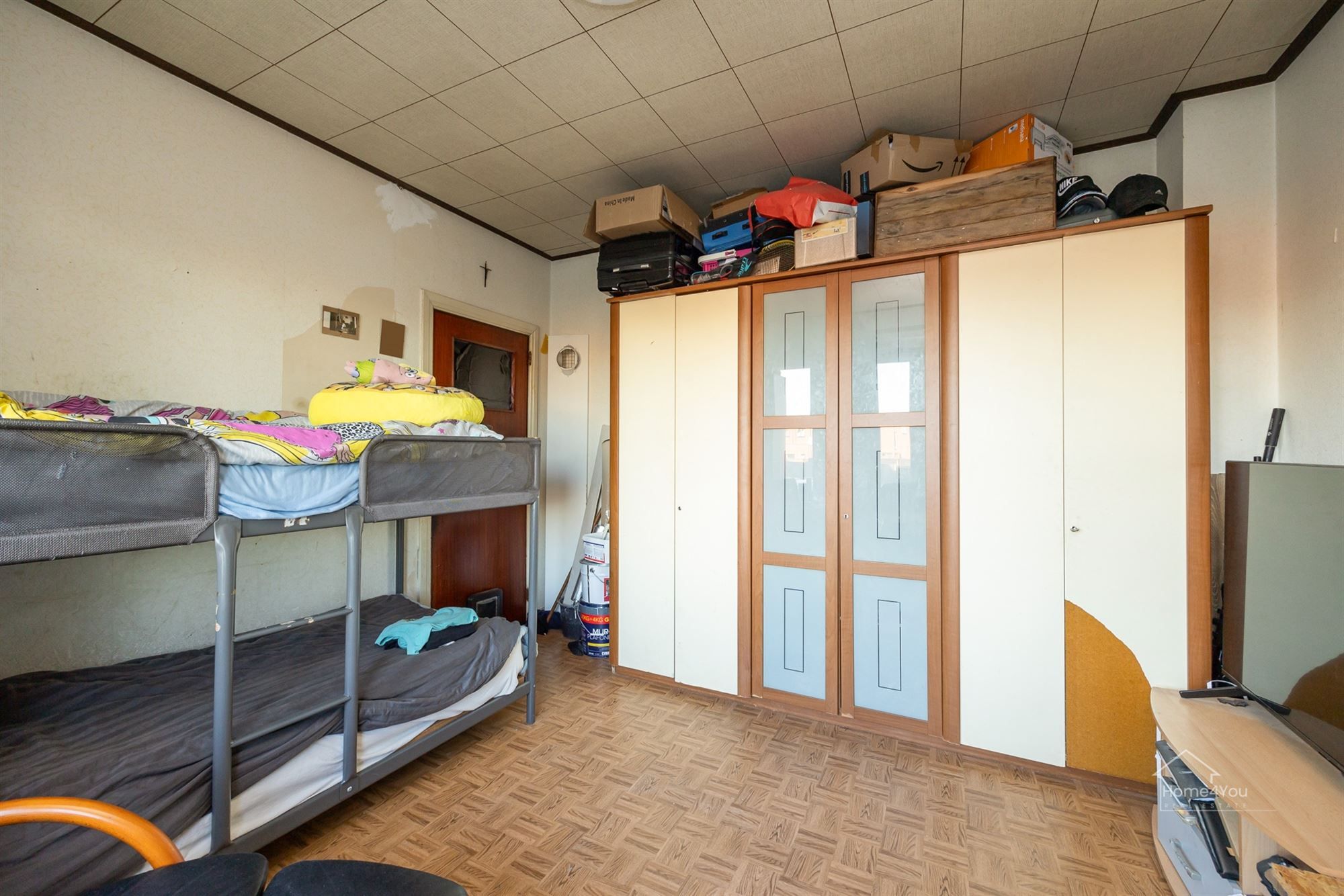 Op te frissen woning met zéér ruime extra zolder foto 13
