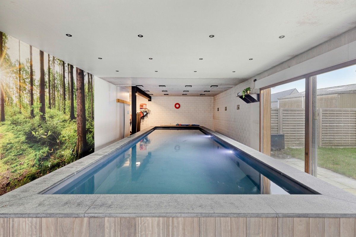 Luxe woning met binnenzwembad en afzonderlijke handelsruimte foto 16