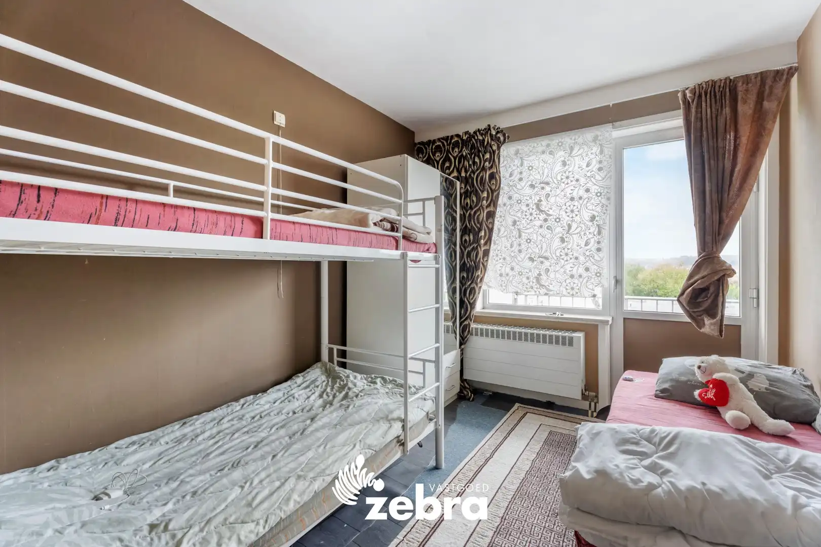 Licht op te frissen appartement op een centrale ligging te Roeselare! foto 10