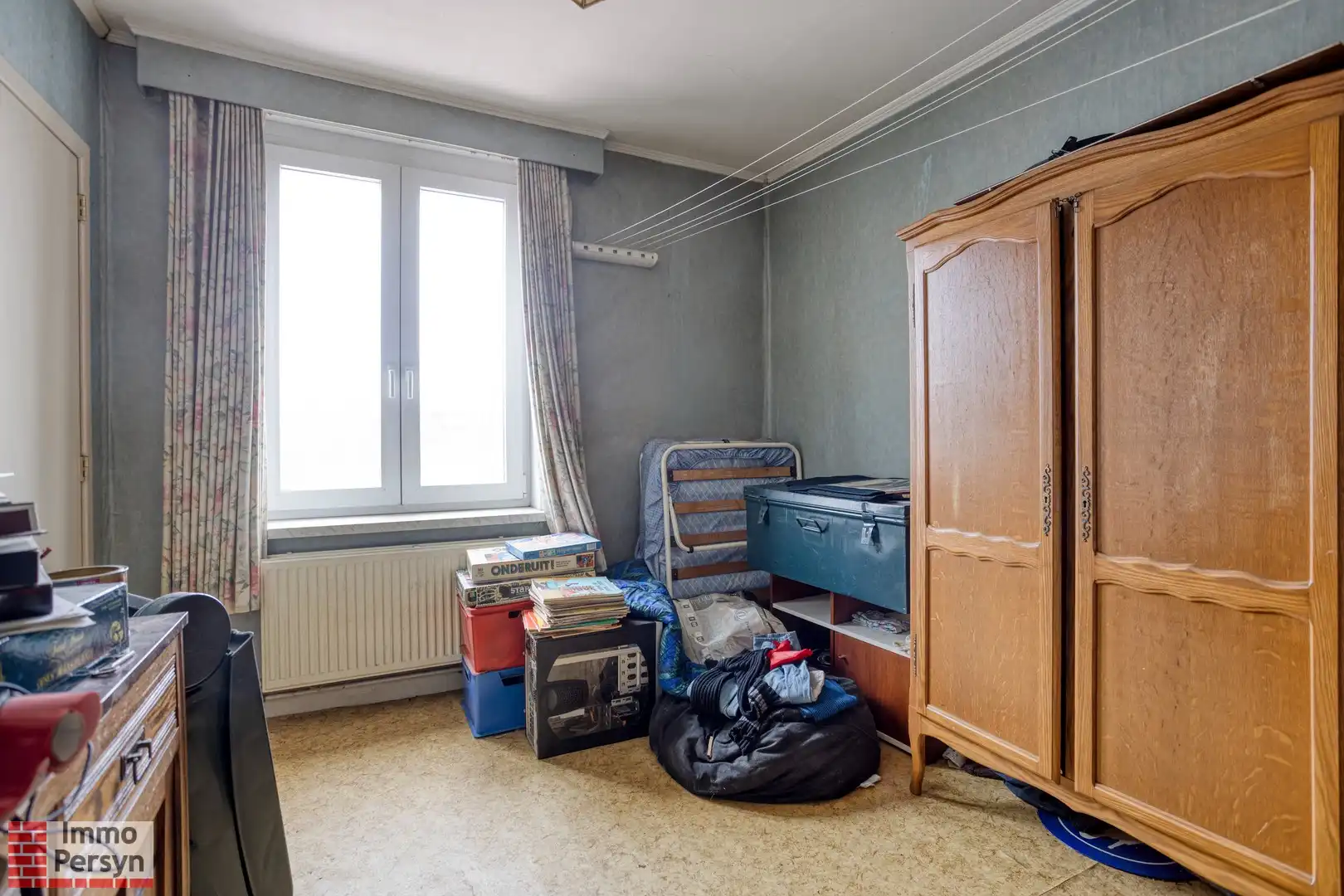 Te renoveren rijwoning met uitbreidingsmogelijkheden en tuin met achteruitgang foto 10