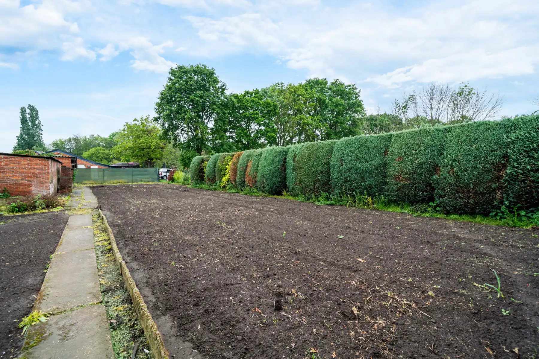 Karaktervolle jaren ’60 gezinswoning met een uitzonderlijk breed perceel (37m) en eindeloos potentieel op een toplocatie in Geel! foto 20