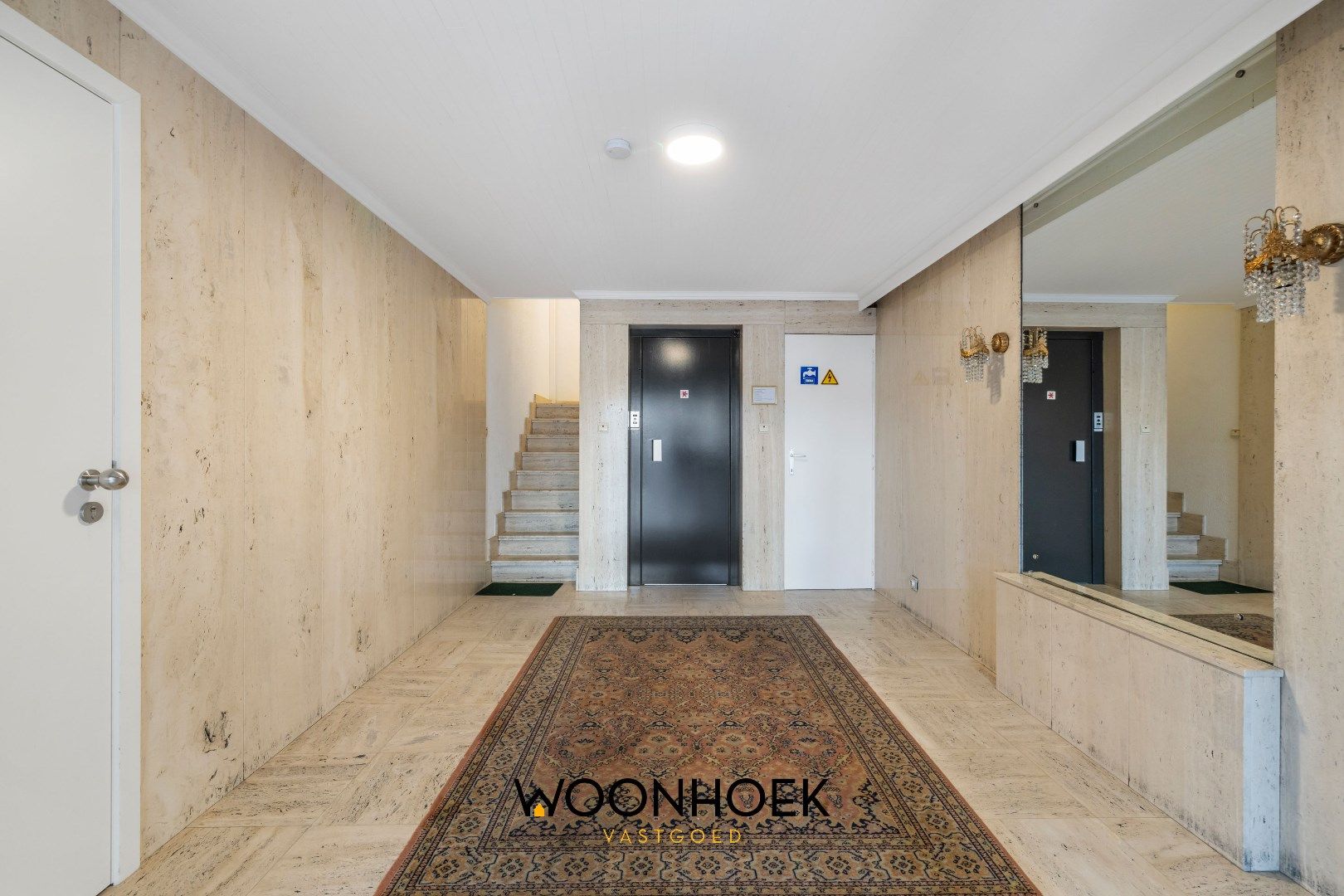 Ruim gerenoveerd 2-slpk appartement in het centrum foto 16