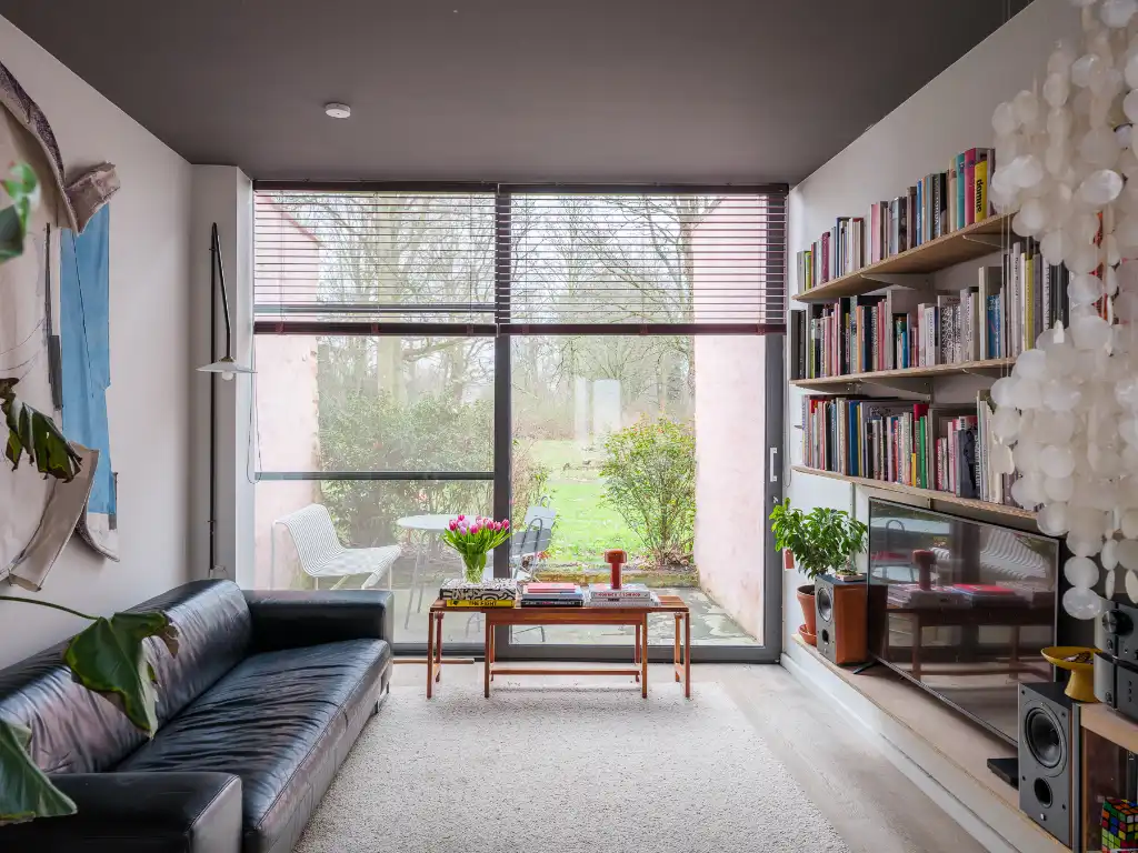 Stijlvolle woning met 3 slaapkamers en parkzicht in de Muide foto {{pictureIndex}}