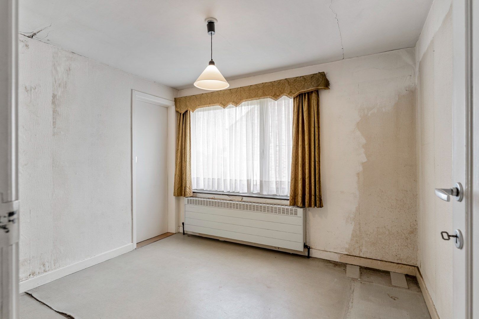 Te renoveren vrijstaande woning op een gunstig gelegen perceel van 12a 07ca vlakbij het centrum foto 21
