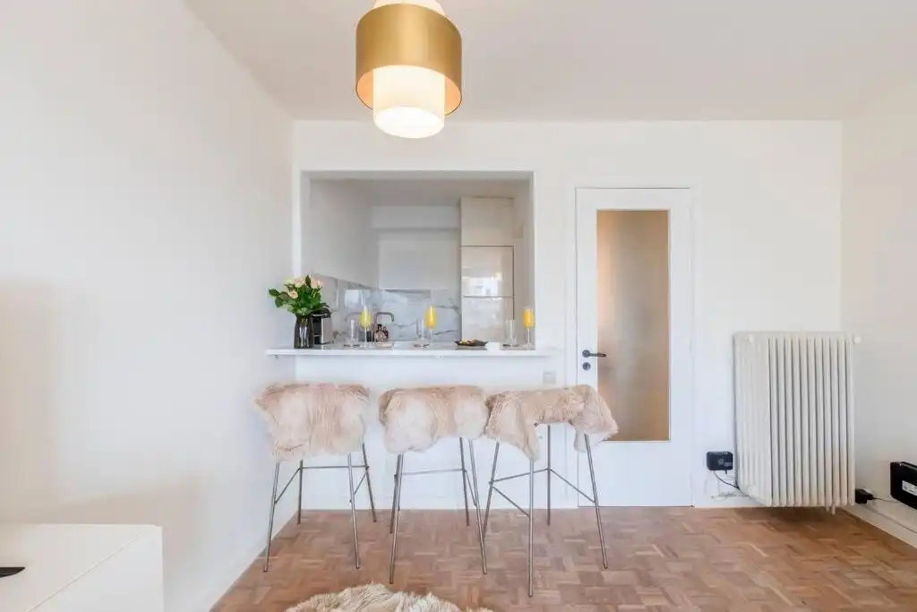 Stijlvol gerenoveerd 1-slaapkamerappartement aan het water in hartje Gent foto 7